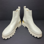 Michael Kors ivory boots size 8M in new, unused condition.