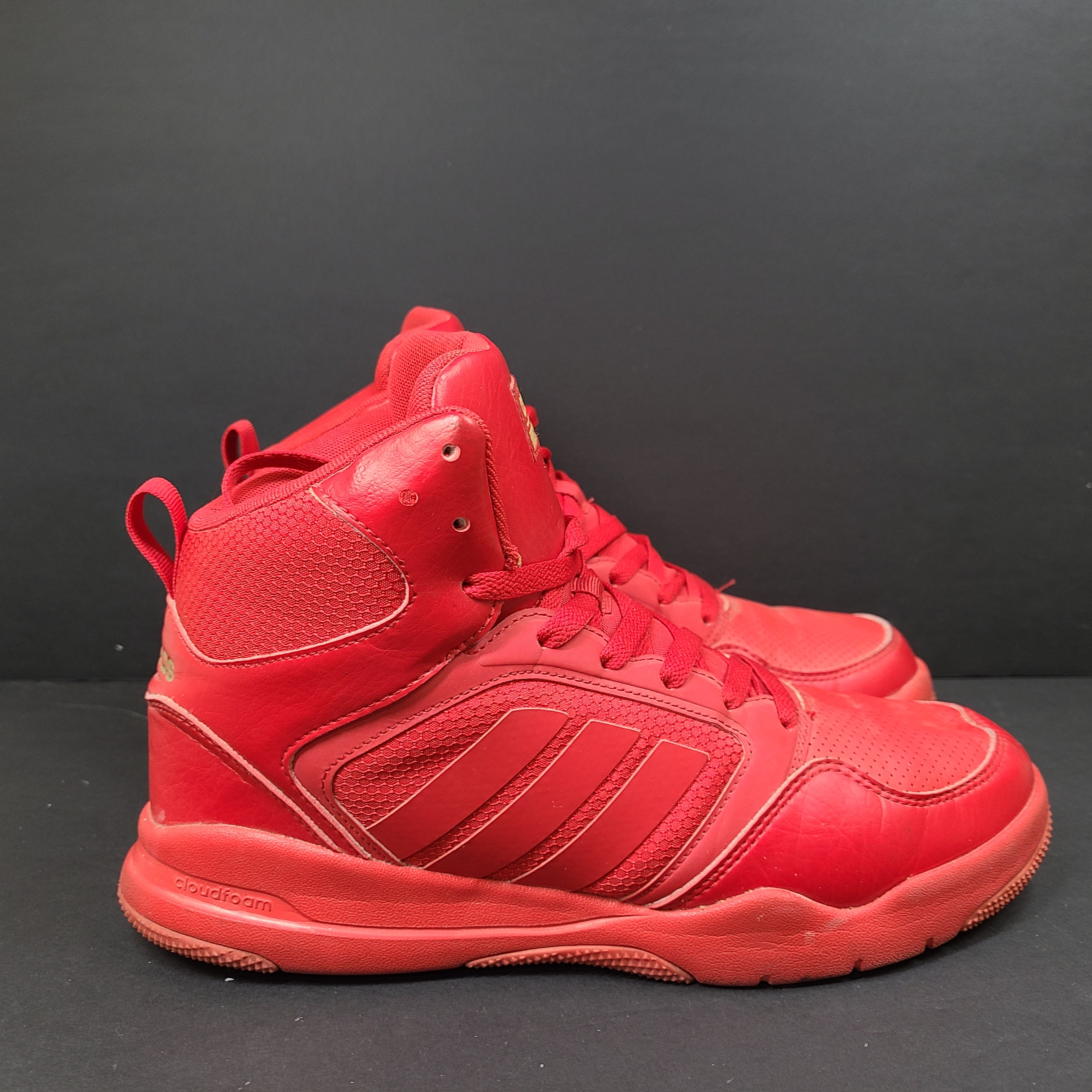 Red Adidas Cloudfoam sneakers size US 8.5 with sole wear and minor creasing.