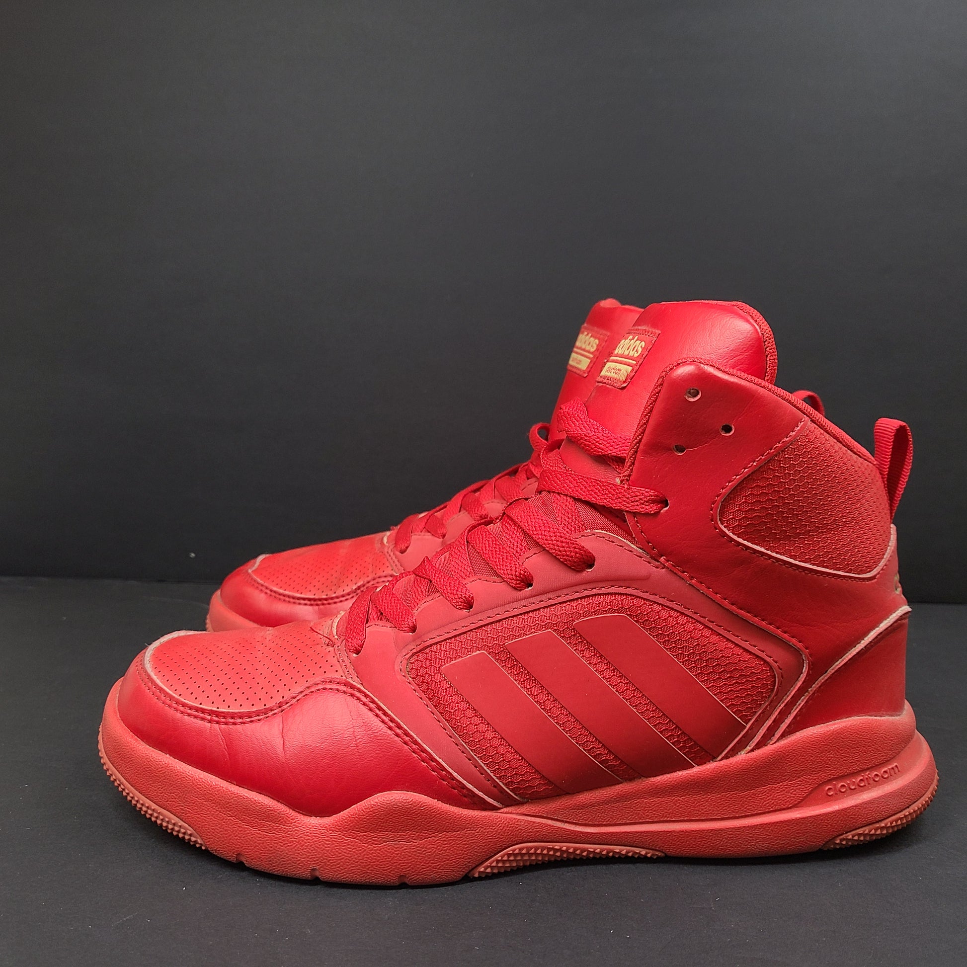 Red Adidas Cloudfoam sneakers size US 8.5 with sole wear and minor creasing.