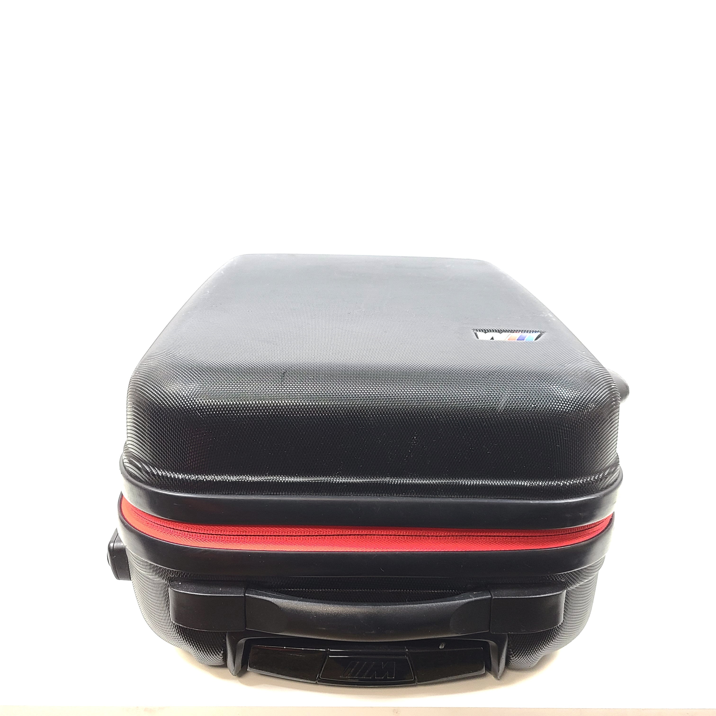 Black and red BMW suitcase featuring a TSA lock and four spinner wheels for easy maneuvering.