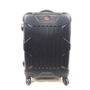 Black hard-shell suitcase with textured finish and 360-degree spinner wheels for smooth mobility.