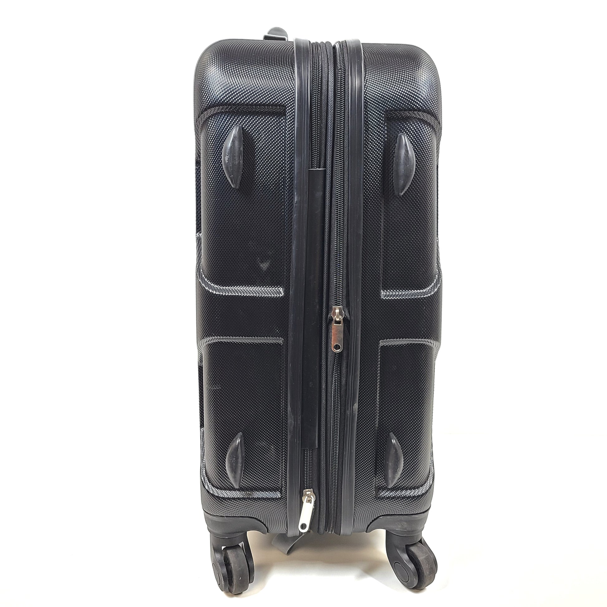 Black hard-shell suitcase with textured finish and 360-degree spinner wheels for smooth mobility.