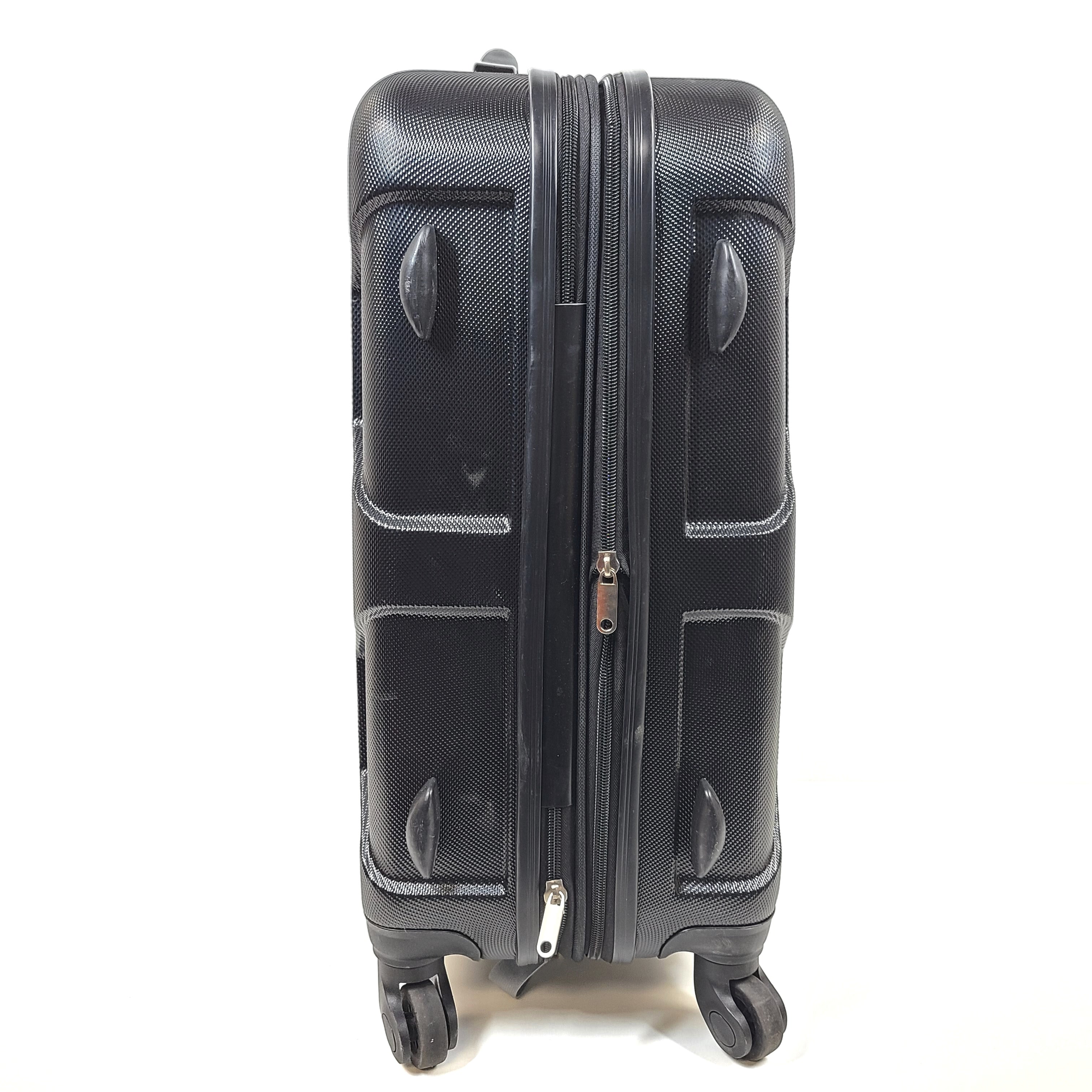 Black hard-shell suitcase with textured finish and 360-degree spinner wheels for smooth mobility.