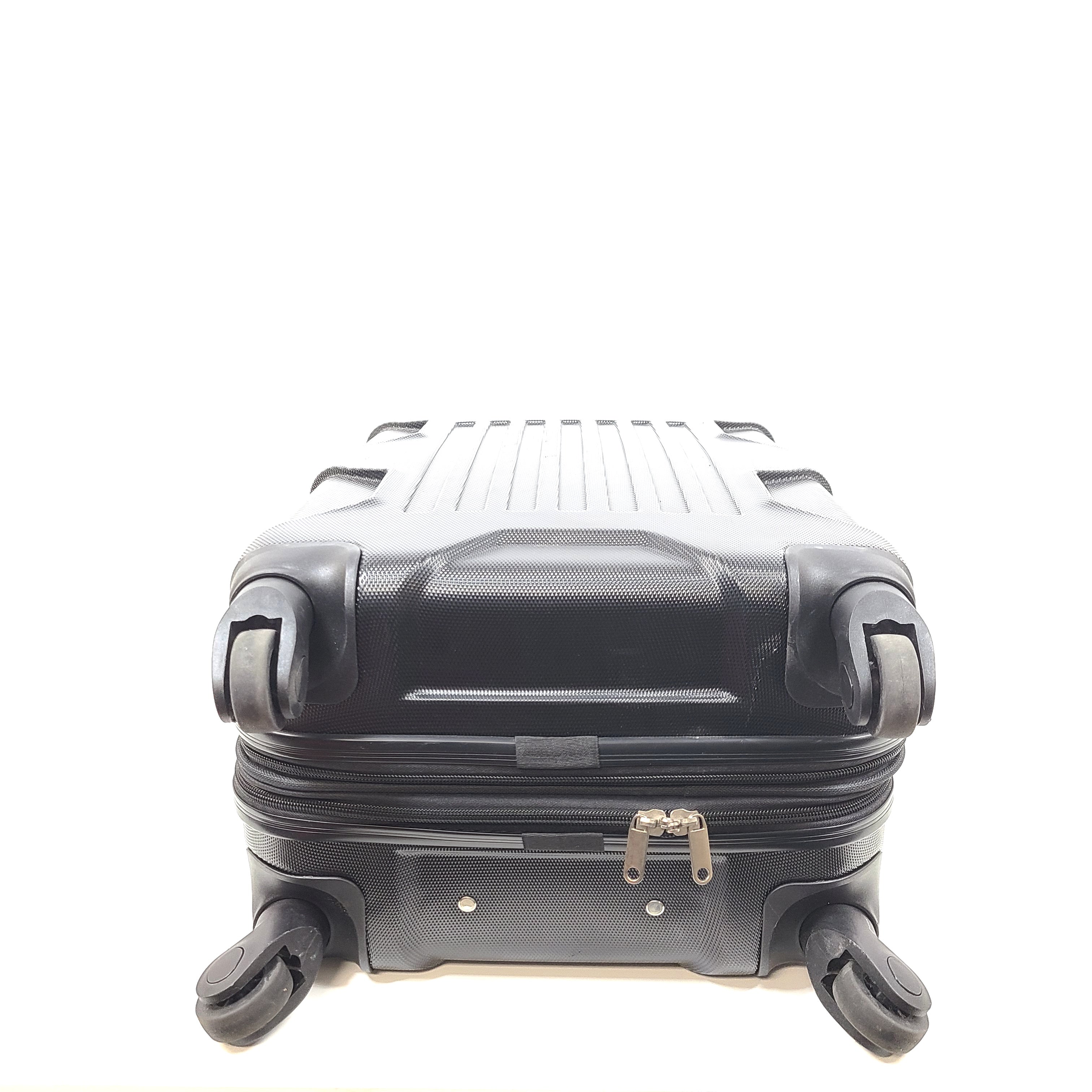 Black hard-shell suitcase with textured finish and 360-degree spinner wheels for smooth mobility.