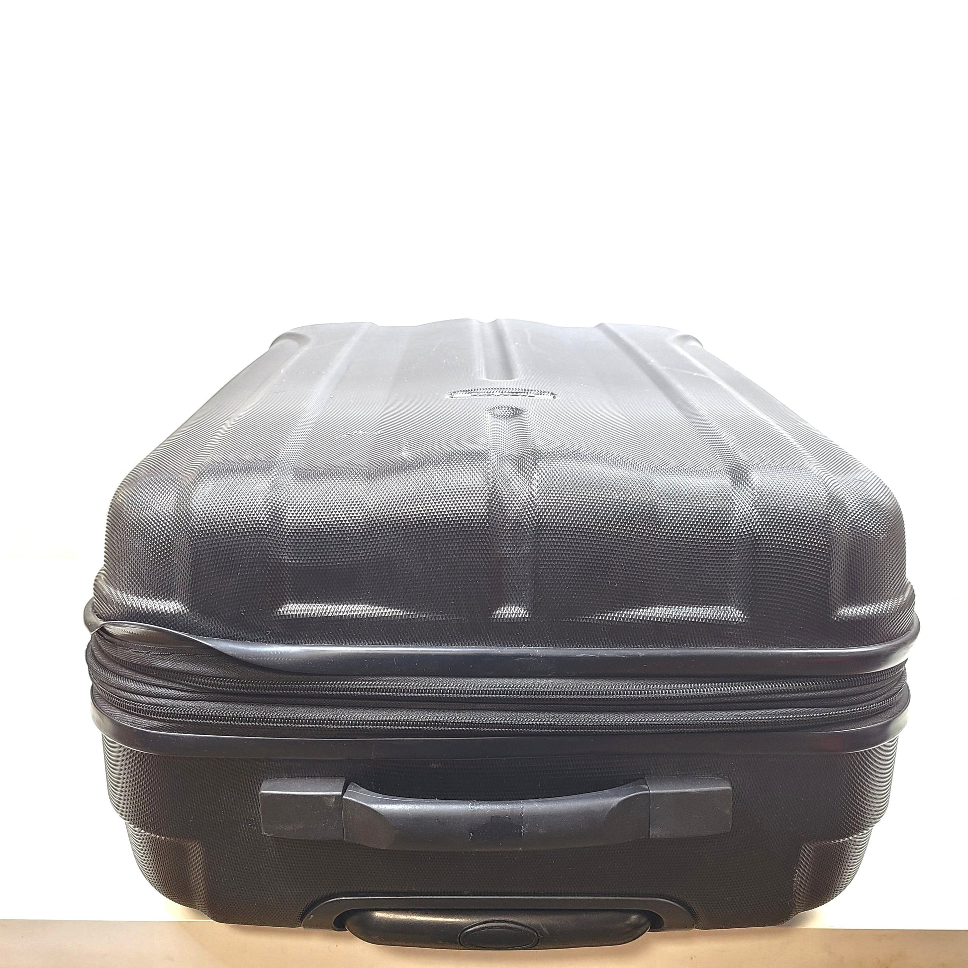 Black Samsonite 4-wheel spinner hardside suitcase with front Samsonite logo and organized interior.