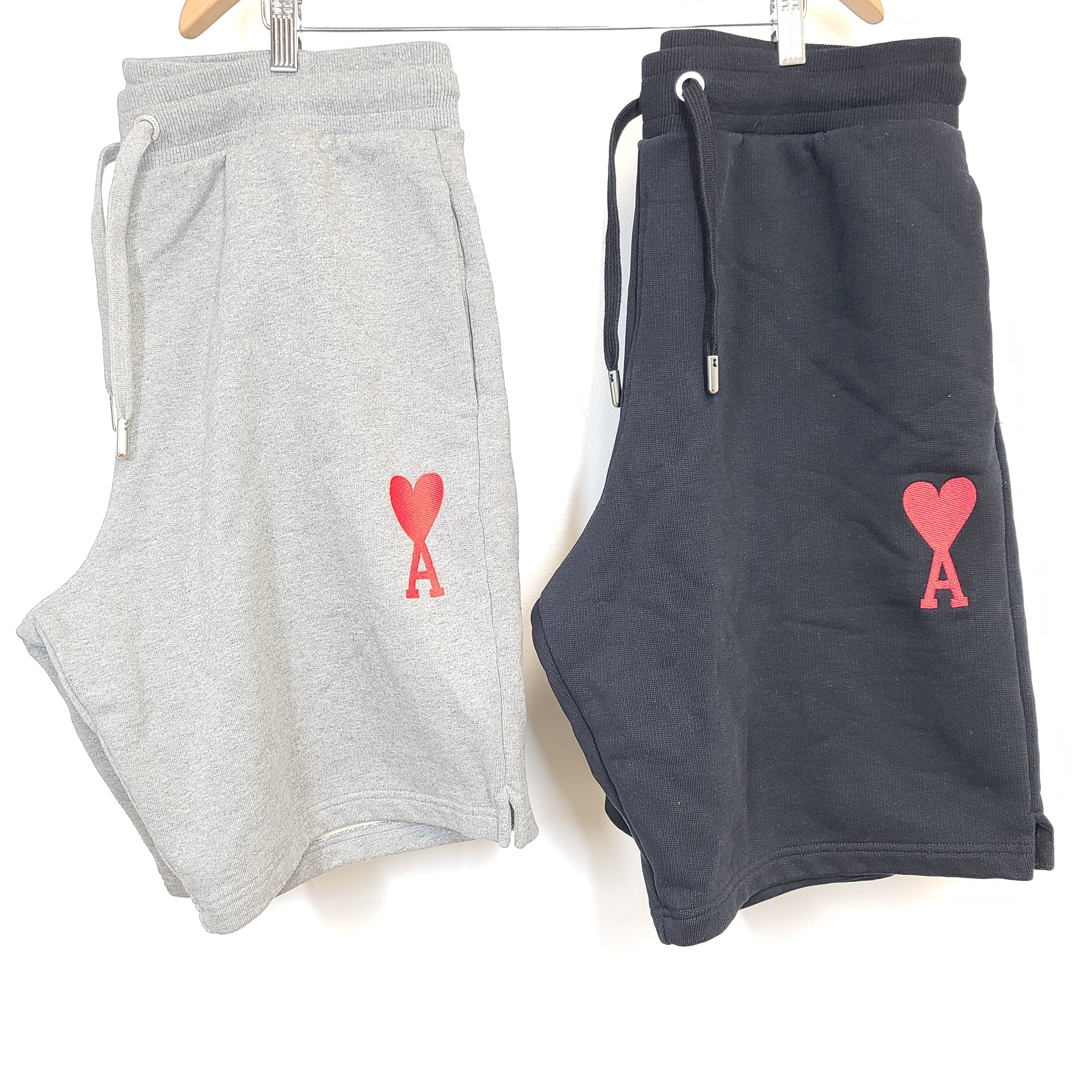 Grey and black AMI Alexandre Mattiussi shorts with a heart patch in organic cotton.