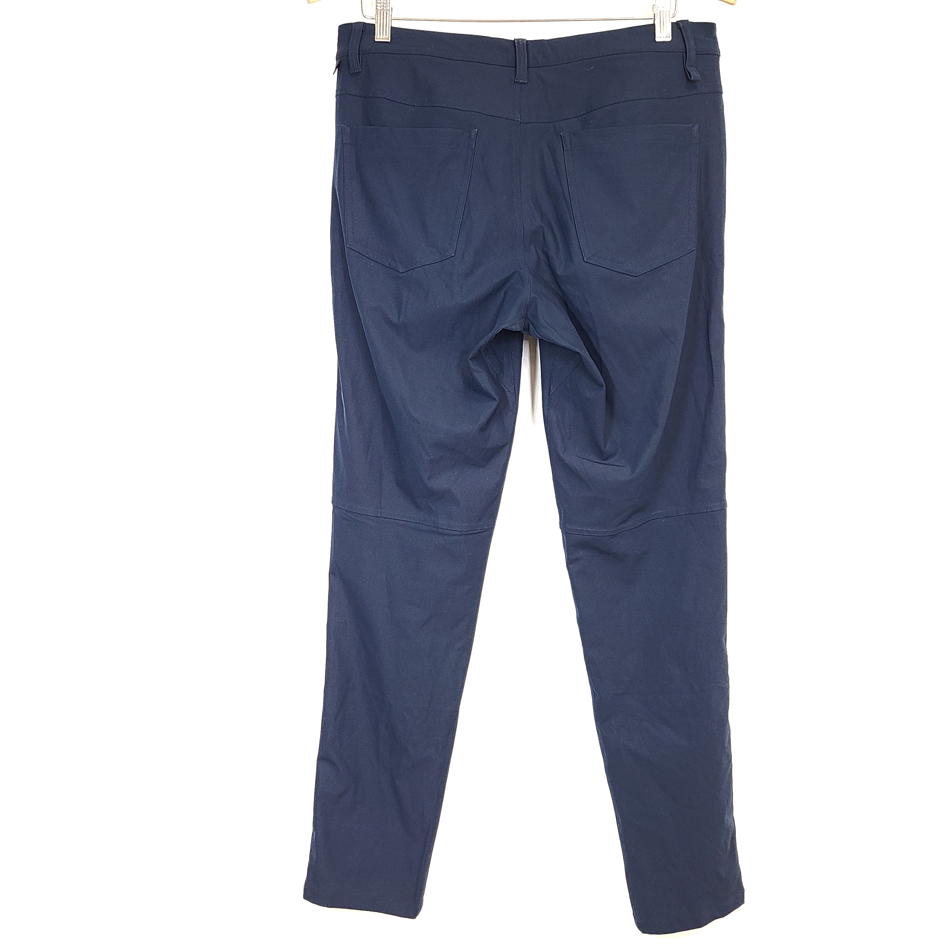 Navy Lululemon men's pants size 32, model D4.0000000, designed for athletic everyday wear.