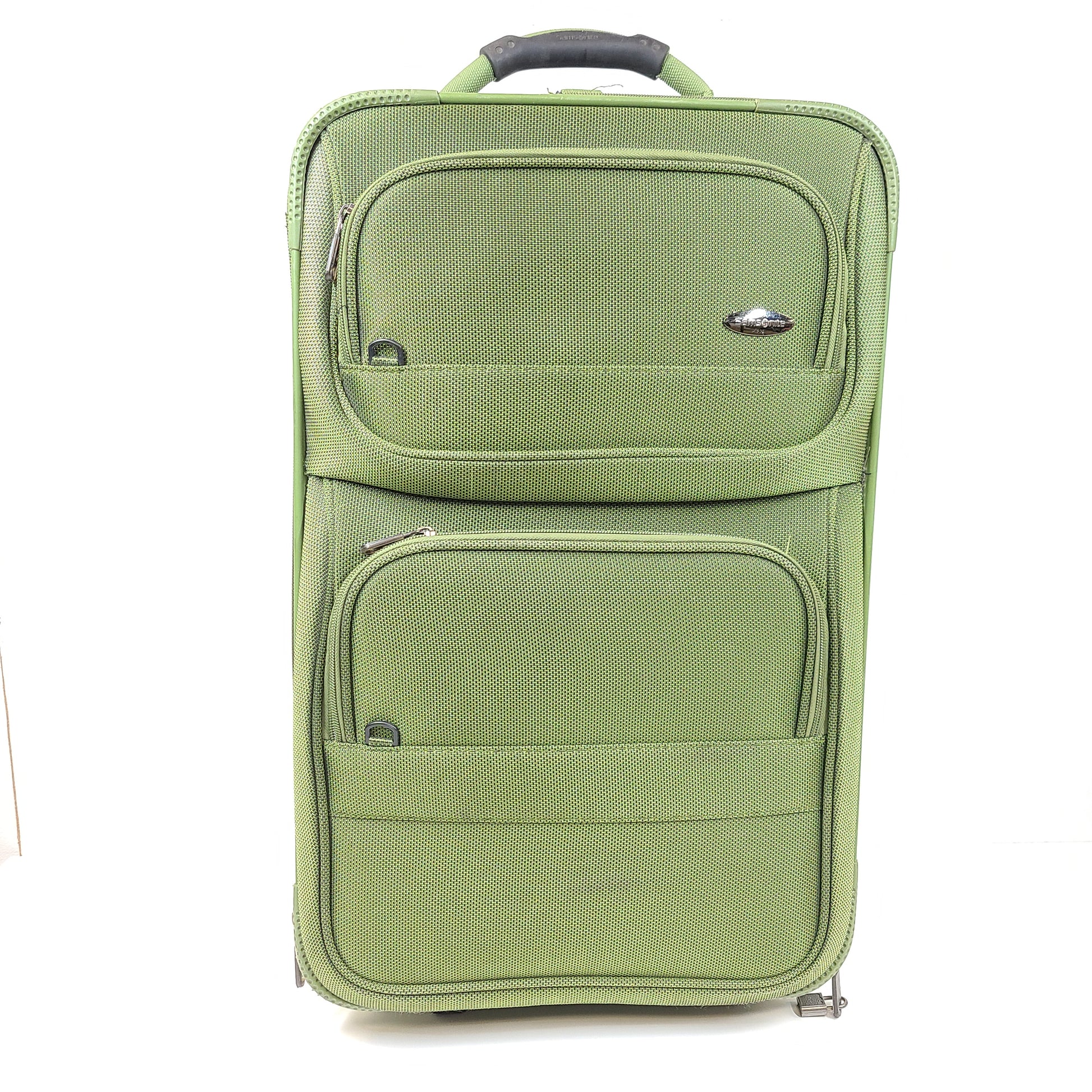 Green Samsonite suitcase model 4500025904 with scuff marks on wheels and handles.