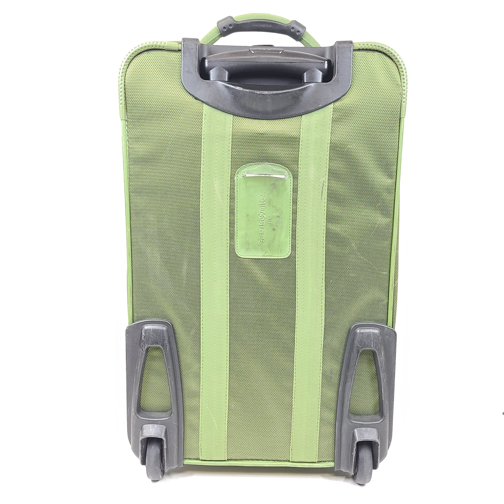 Green Samsonite suitcase model 4500025904 with scuff marks on wheels and handles.