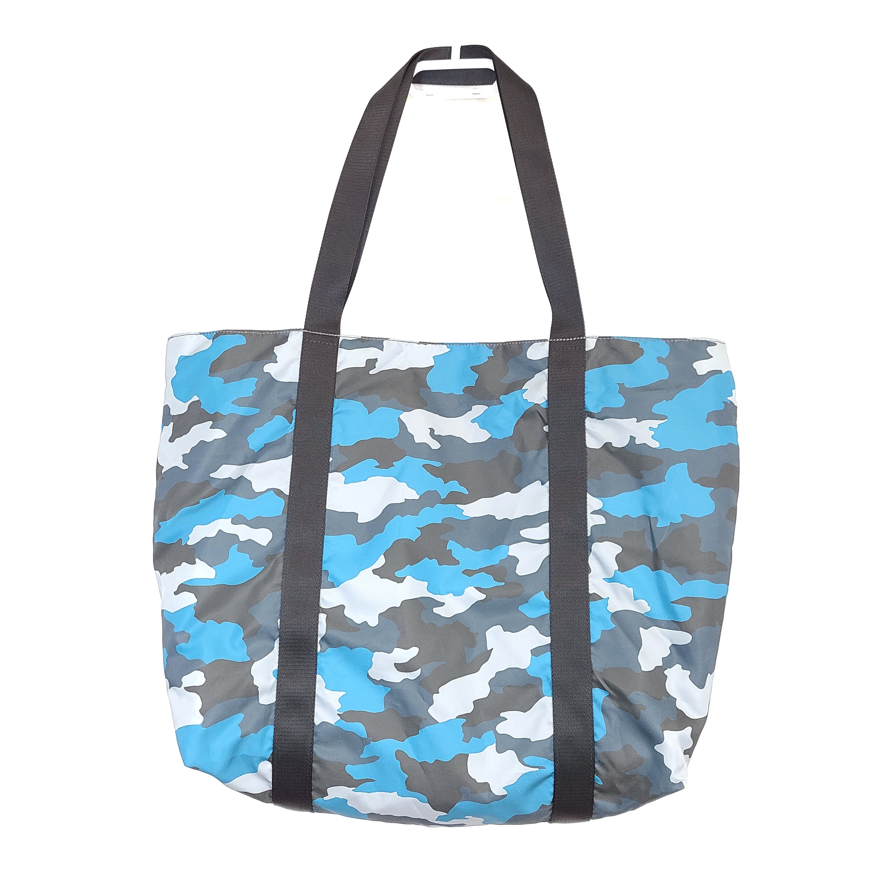 Multicolor Lululemon camouflage tote with pink, brown, green and blue panels and an internal label reading "items of importance".