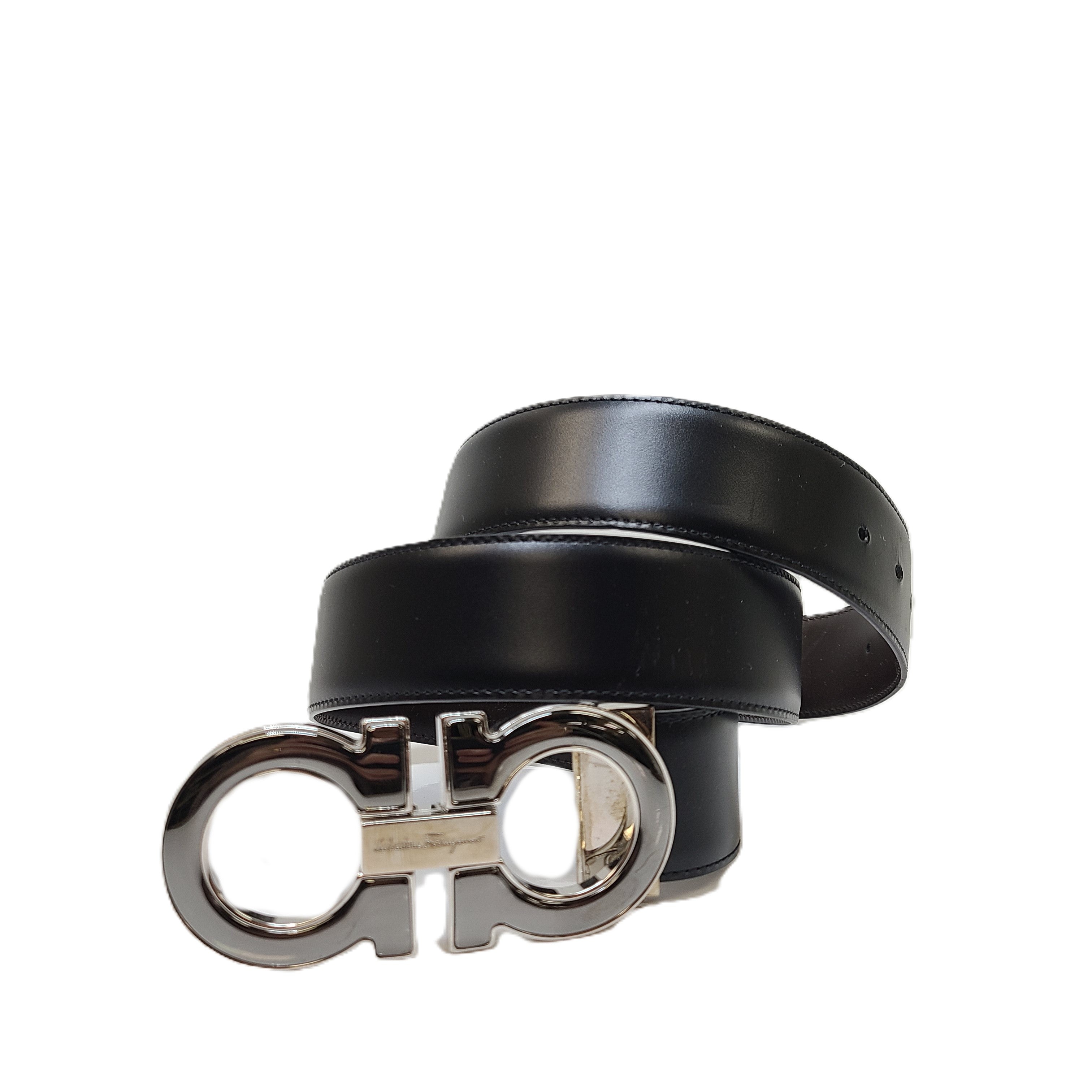 Salvatore Ferragamo black leather belt with refined buckle and Italian craftsmanship.
