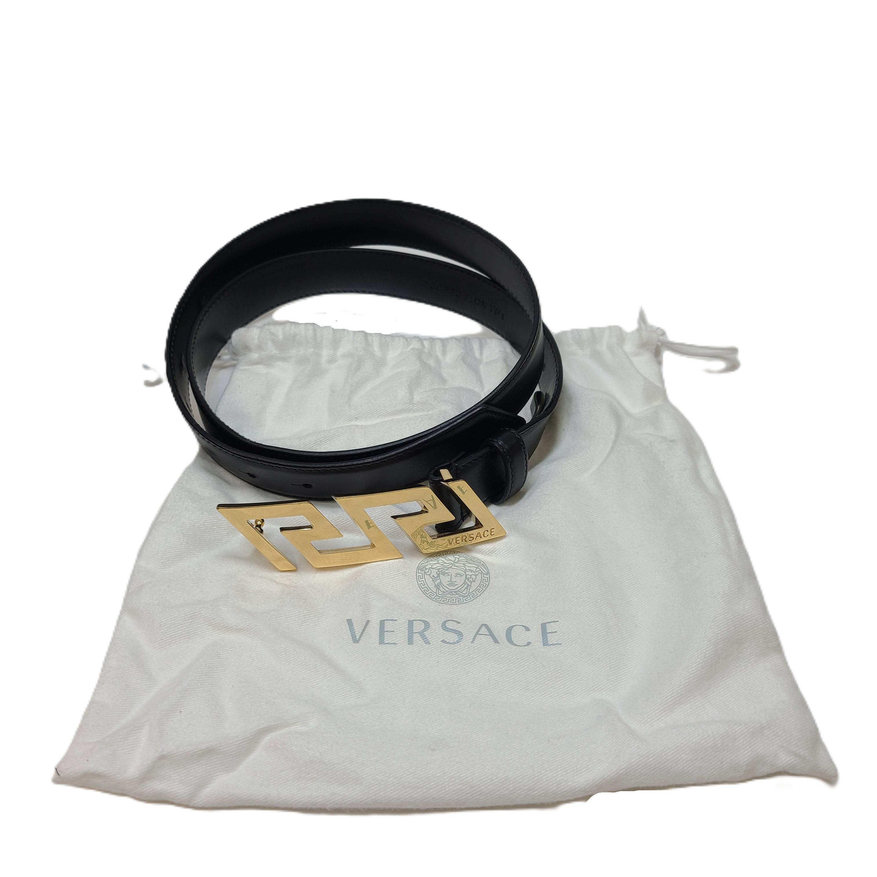 Black Versace leather belt with a gold Medusa buckle, sized 95/38.