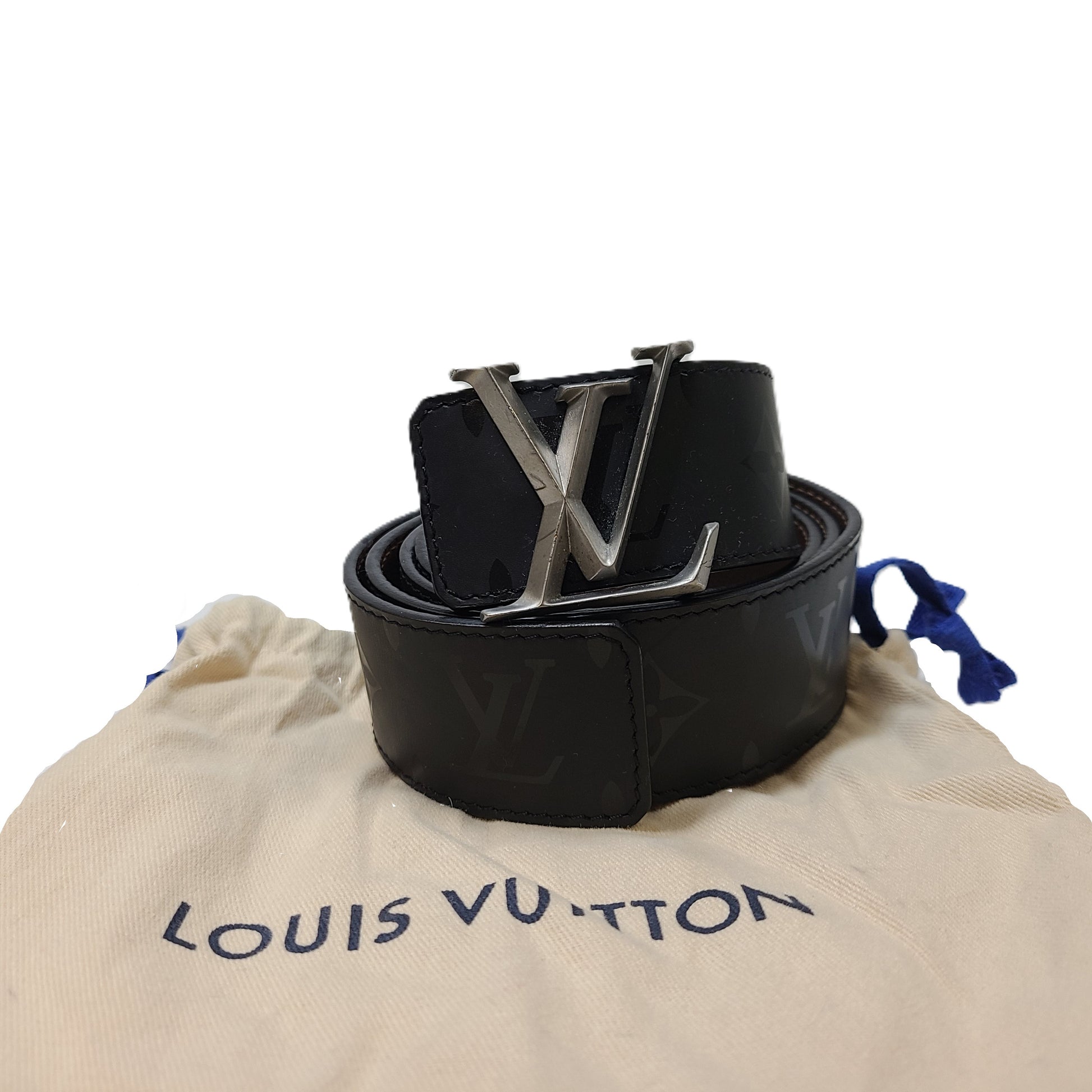 A black Louis Vuitton leather belt with monogram pattern, polished buckle, and Louis Vuitton Paris stamp.
