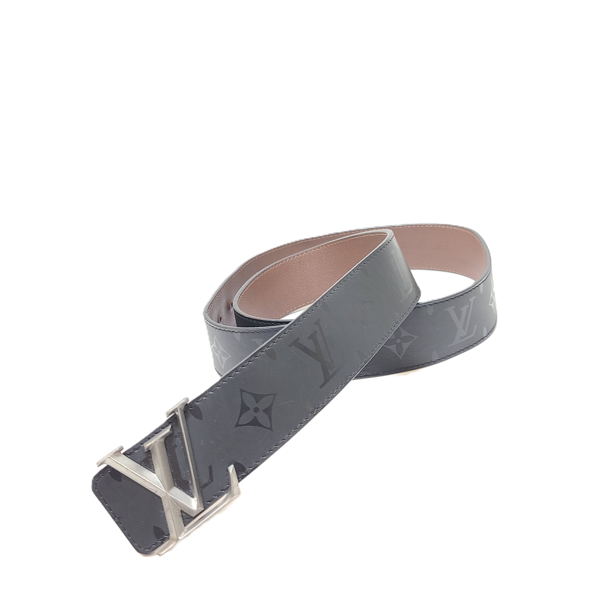 A black Louis Vuitton leather belt with monogram pattern, polished buckle, and Louis Vuitton Paris stamp.