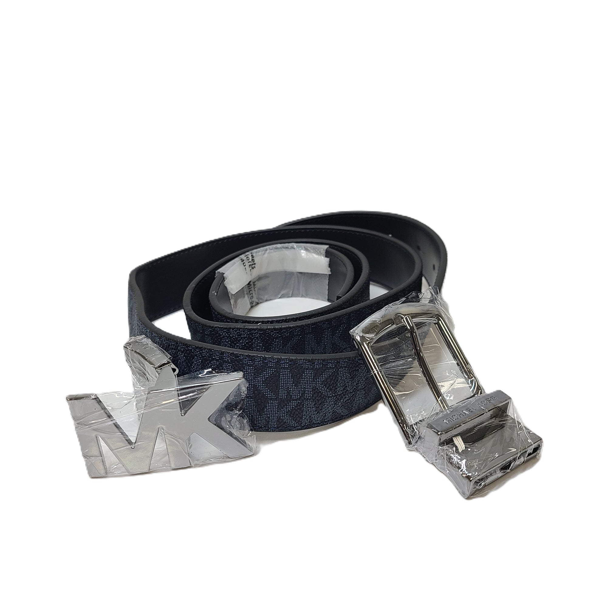 A reversible Michael Kors leather belt in blue and black with an MK logo buckle and a standard buckle.