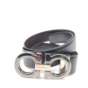 Salvatore Ferragamo black leather belt with refined buckle and Italian craftsmanship.