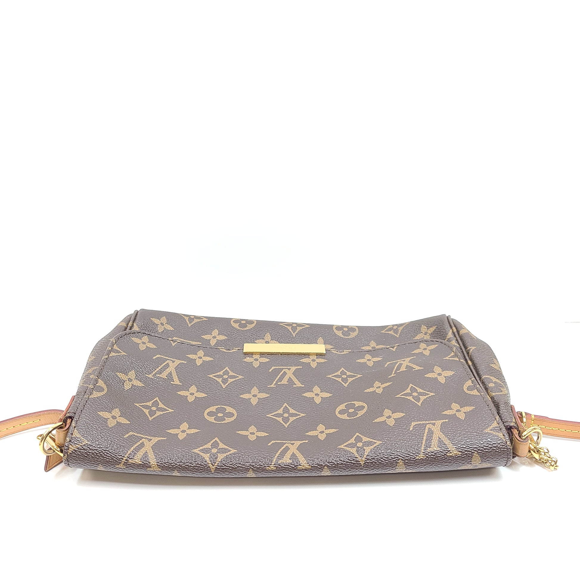 Louis Vuitton Monogram Canvas brown handbag, model DU1165, with classic monogram and leather trim.