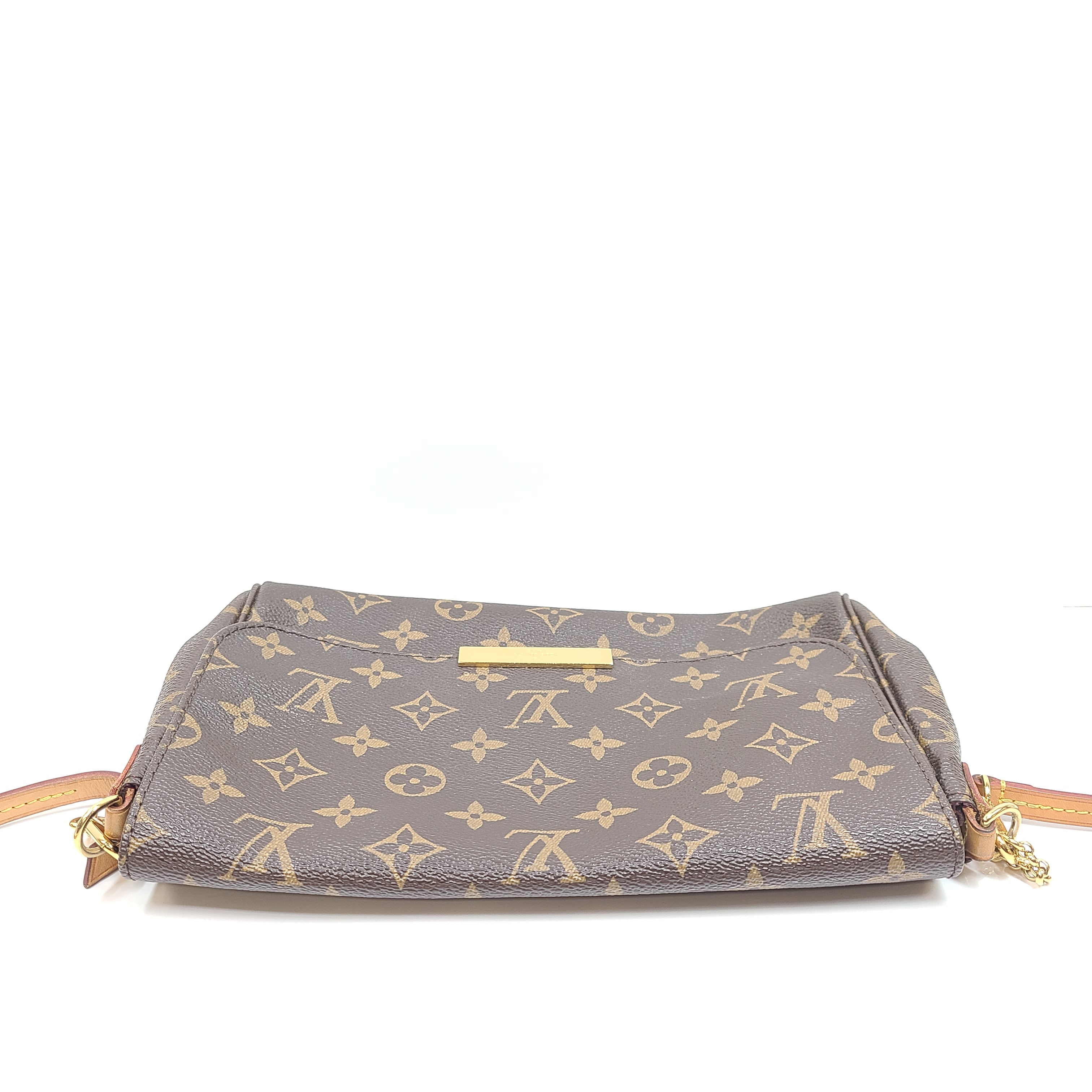 Louis Vuitton Monogram Canvas brown handbag, model DU1165, with classic monogram and leather trim.