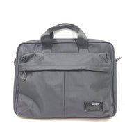 Black Samsonite laptop bag crafted from polyester and microfiber with a slim travel profile and padded laptop compartment.