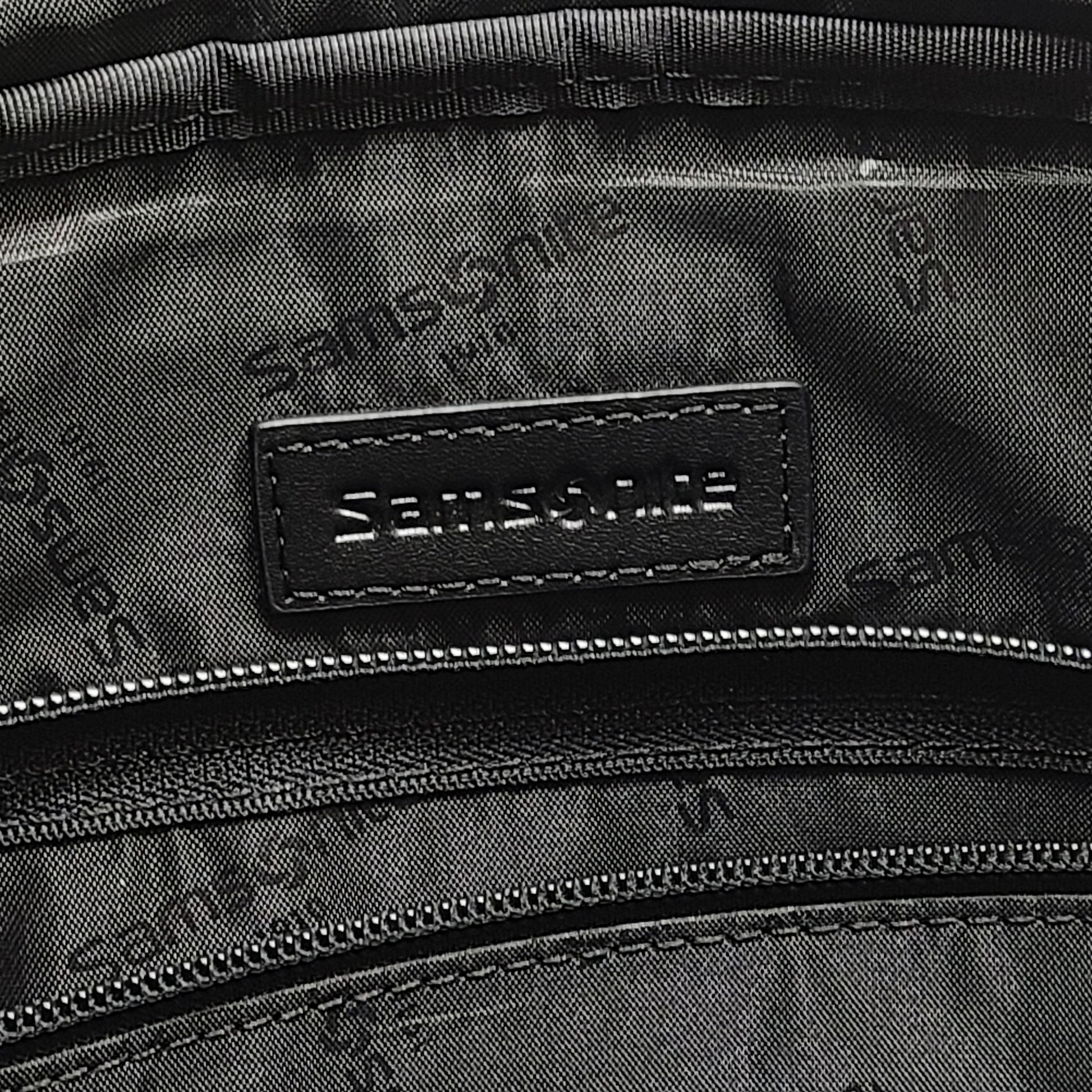 Black Samsonite laptop bag crafted from polyester and microfiber with a slim travel profile and padded laptop compartment.