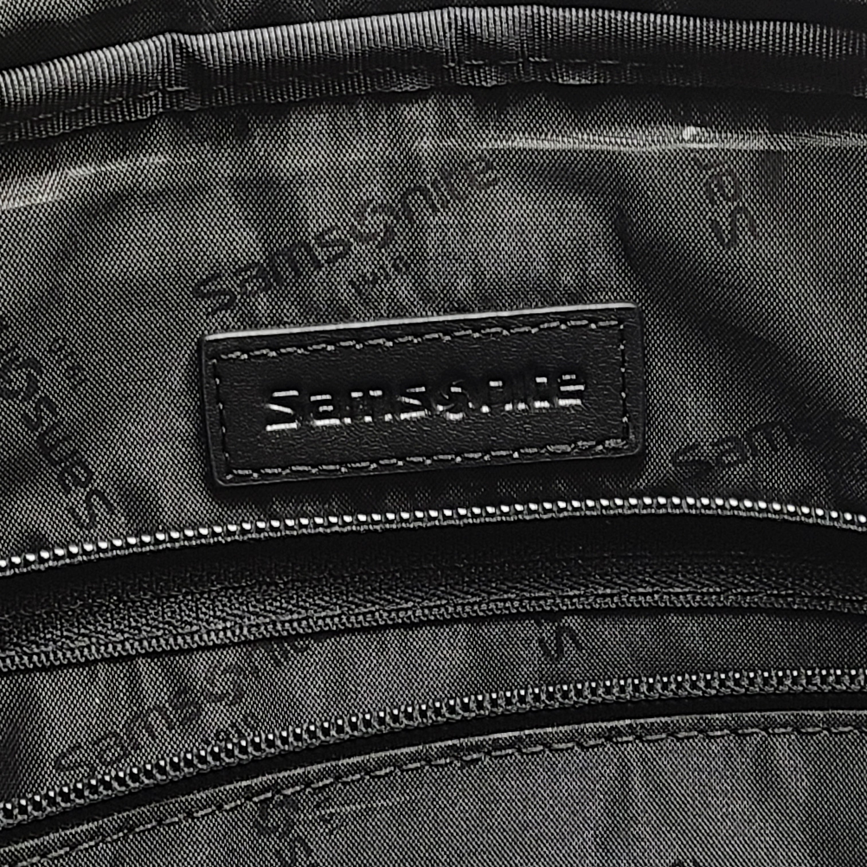 Black Samsonite laptop bag crafted from polyester and microfiber with a slim travel profile and padded laptop compartment.