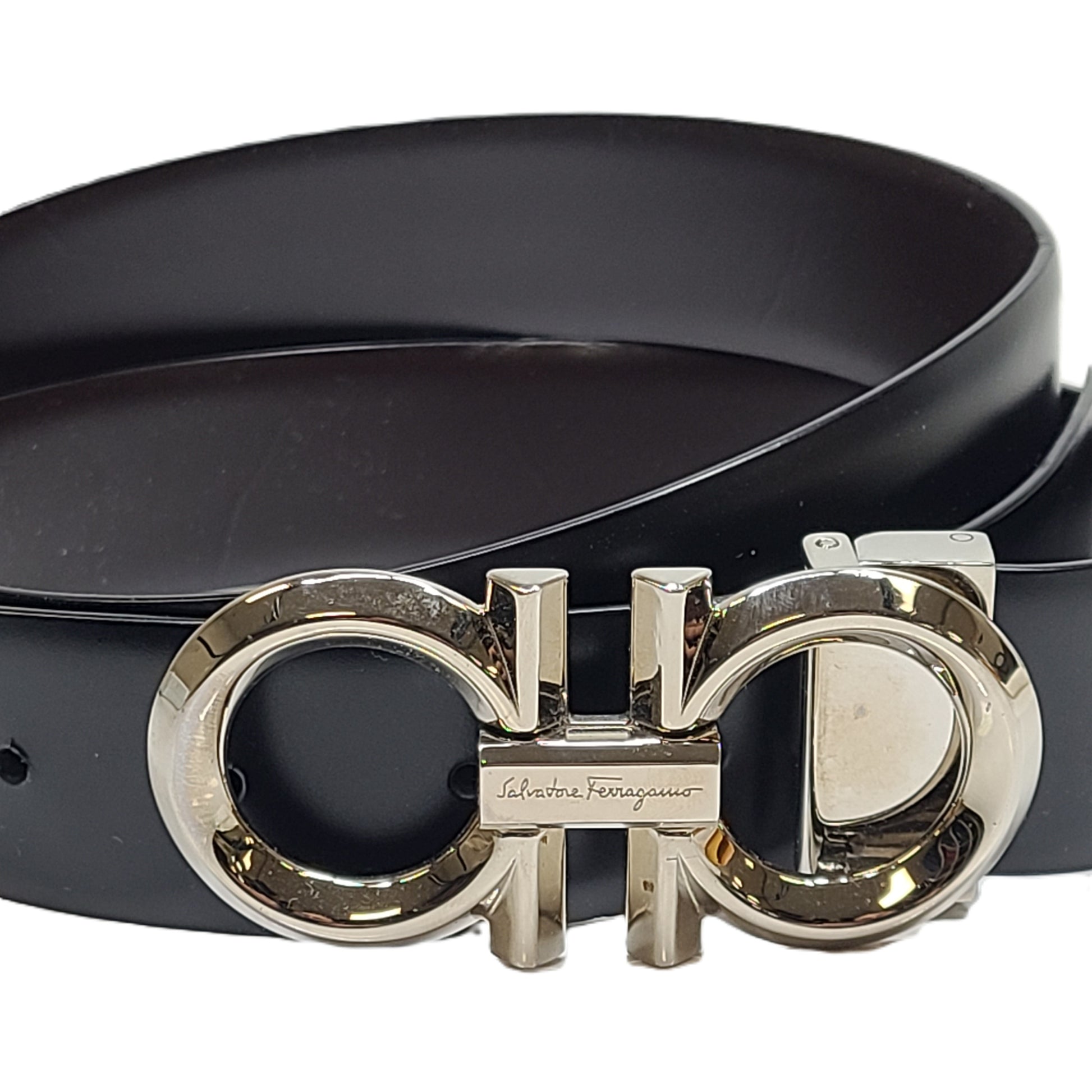 Black Salvatore Ferragamo leather belt that conveys refined Italian craftsmanship and modern elegance.
