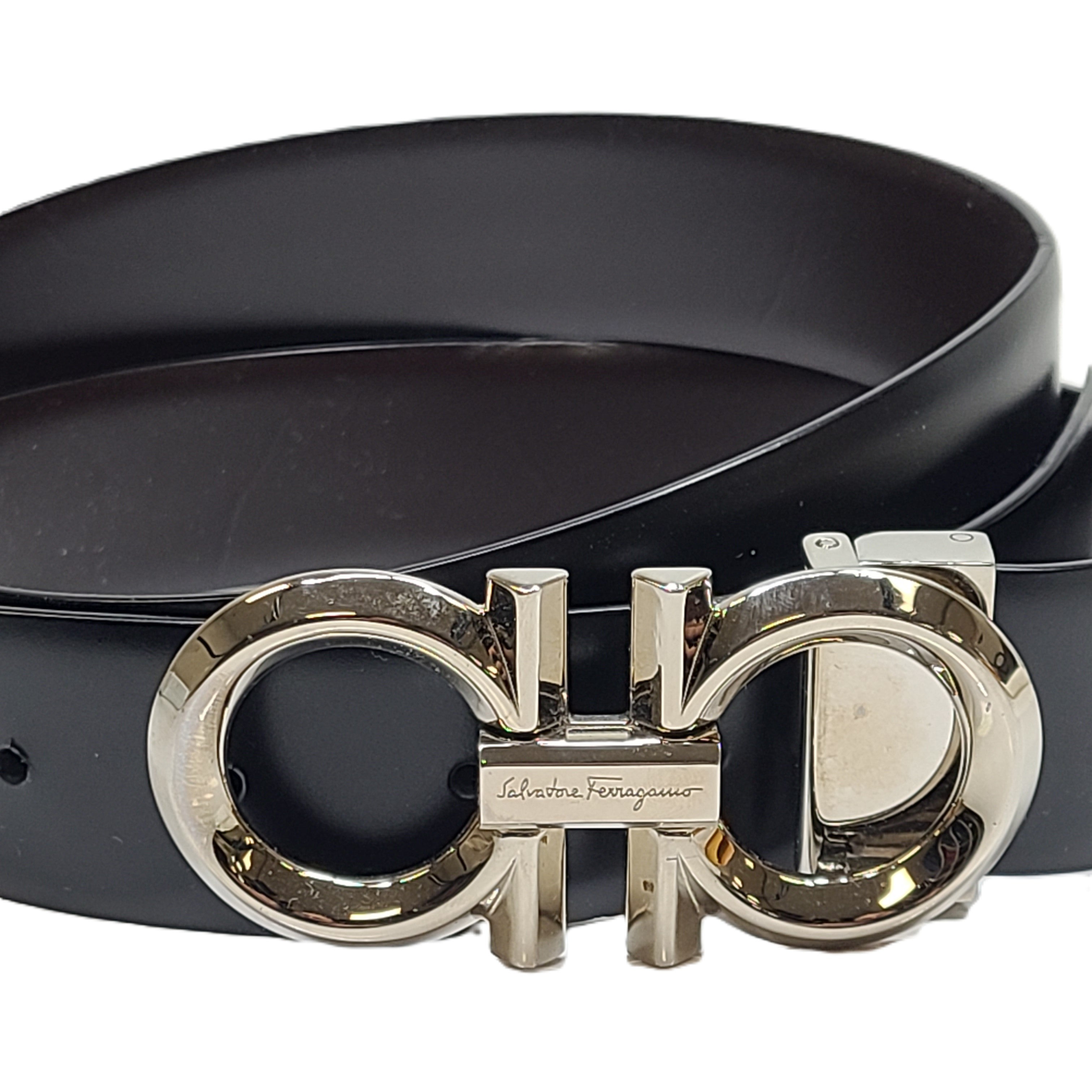 Black Salvatore Ferragamo leather belt that conveys refined Italian craftsmanship and modern elegance.