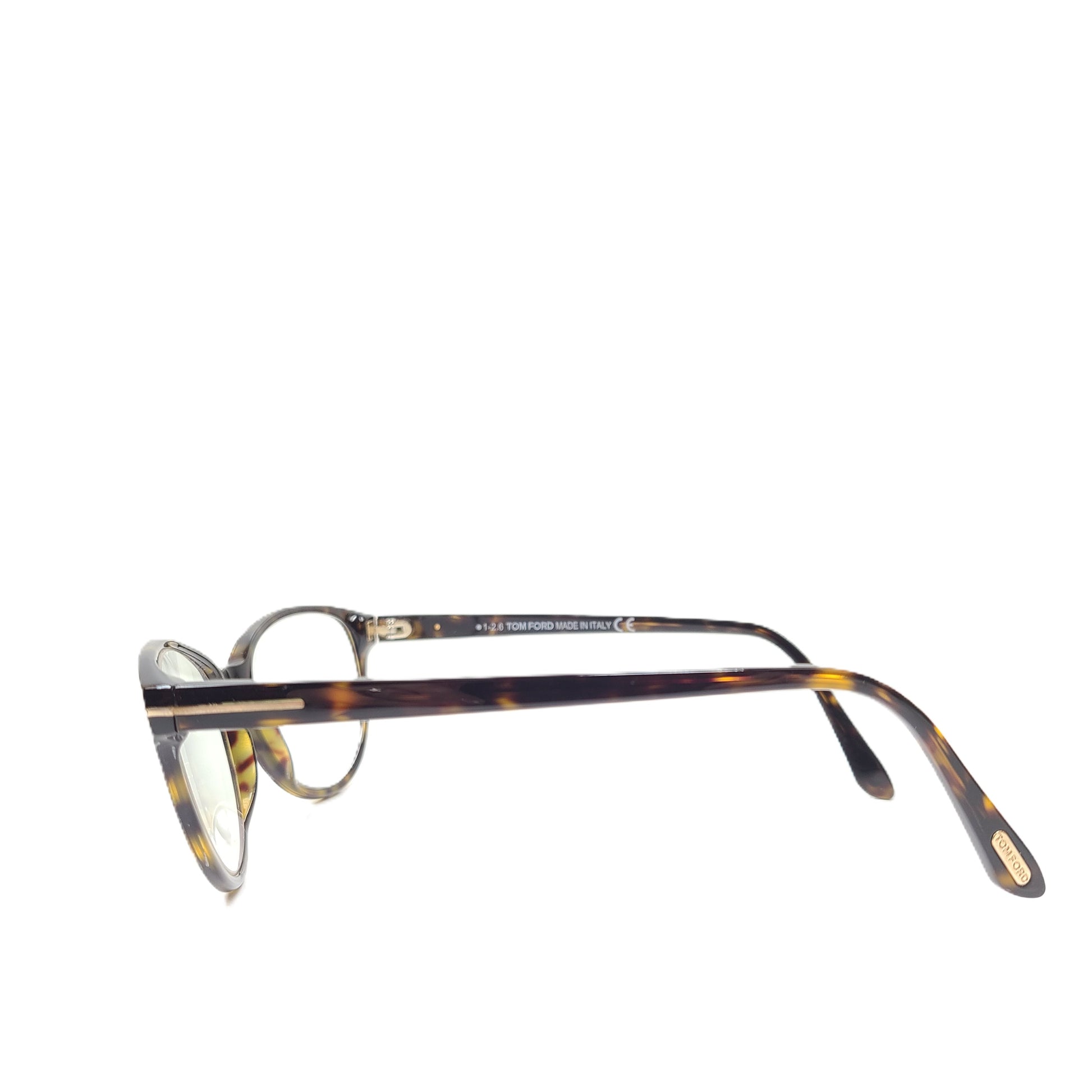 Classic Tom Ford tortoise optical frames in a 53mm size with refined Italian construction.
