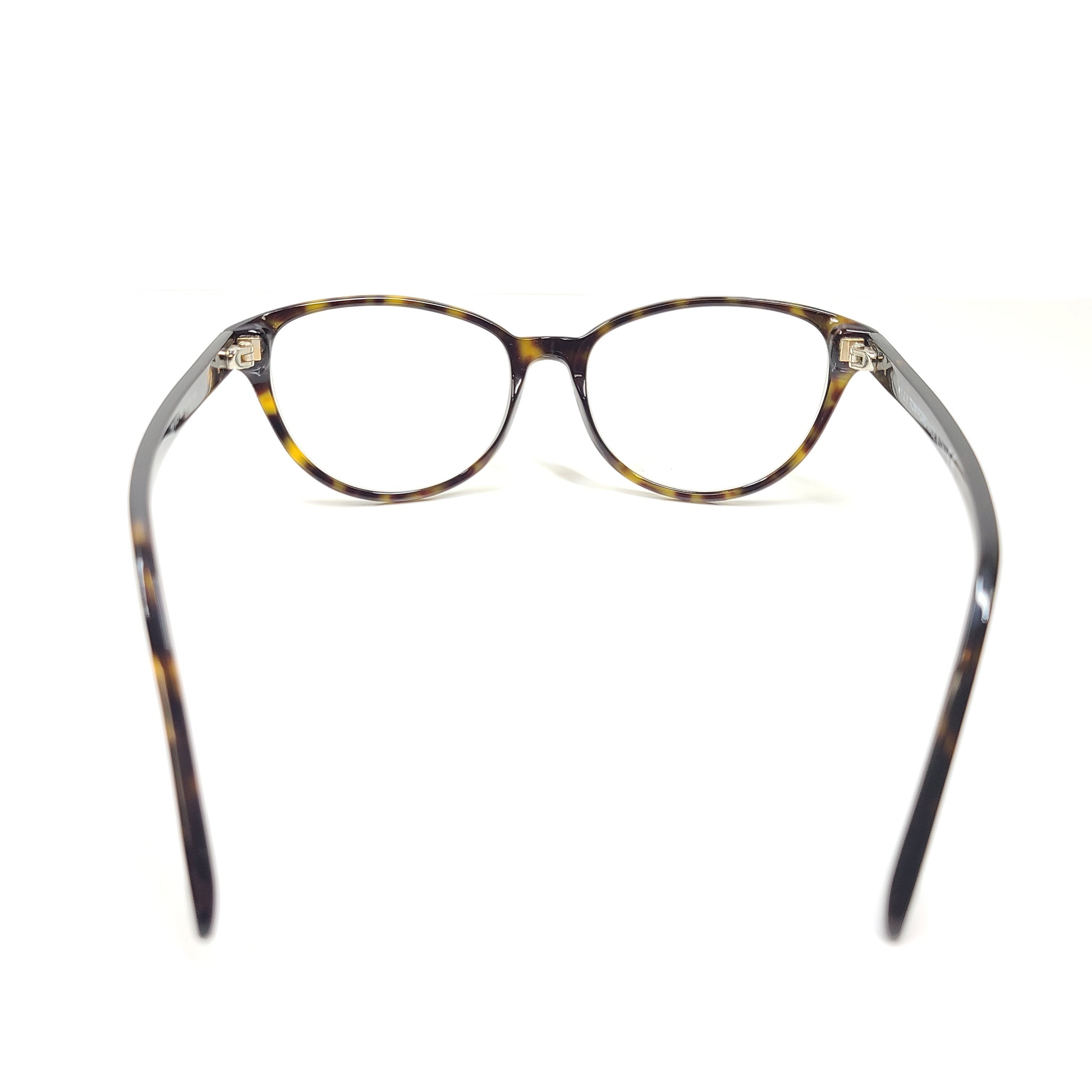 Classic Tom Ford tortoise optical frames in a 53mm size with refined Italian construction.