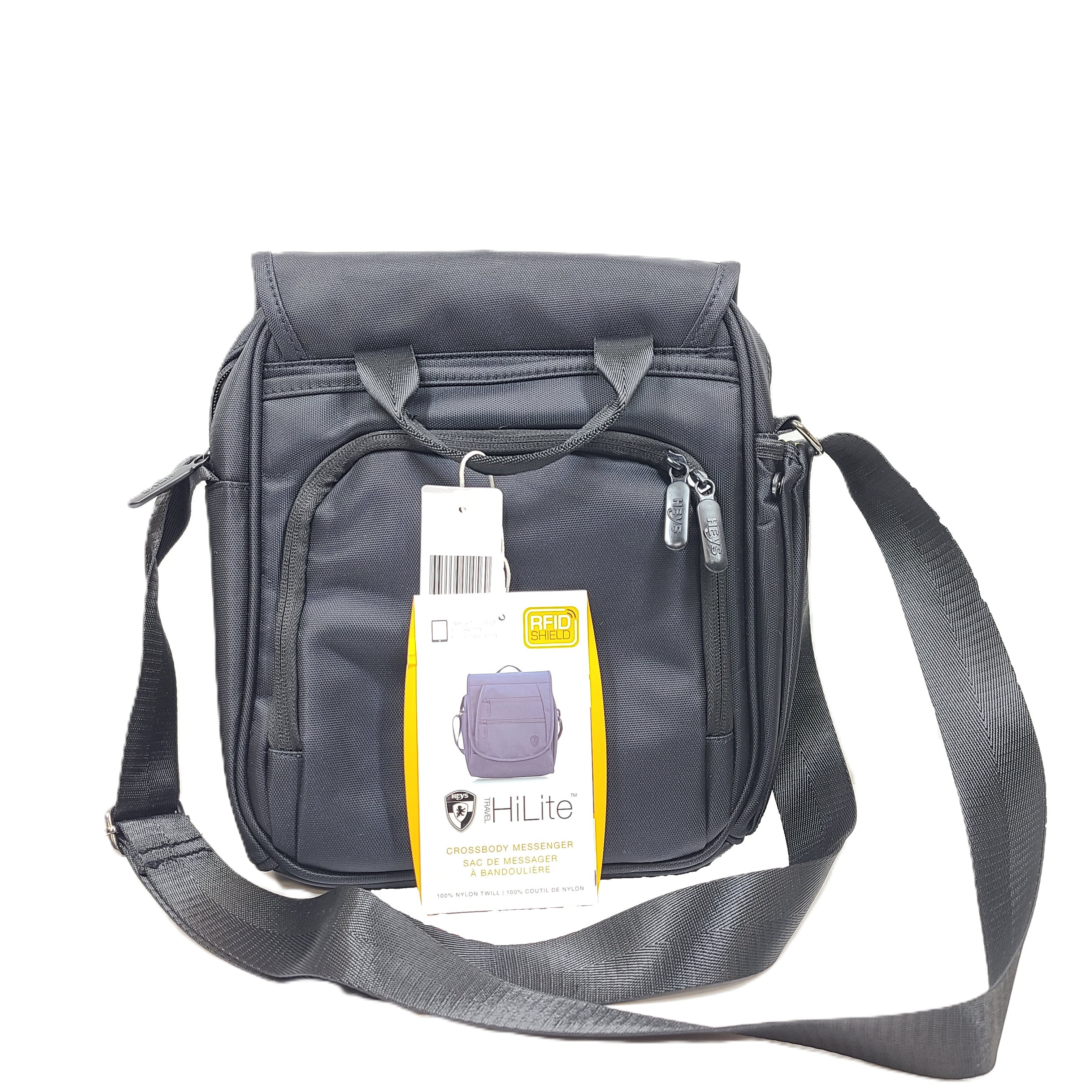 Compact black RFID-shield crossbody messenger bag with magnetic front flap for secure everyday carry.
