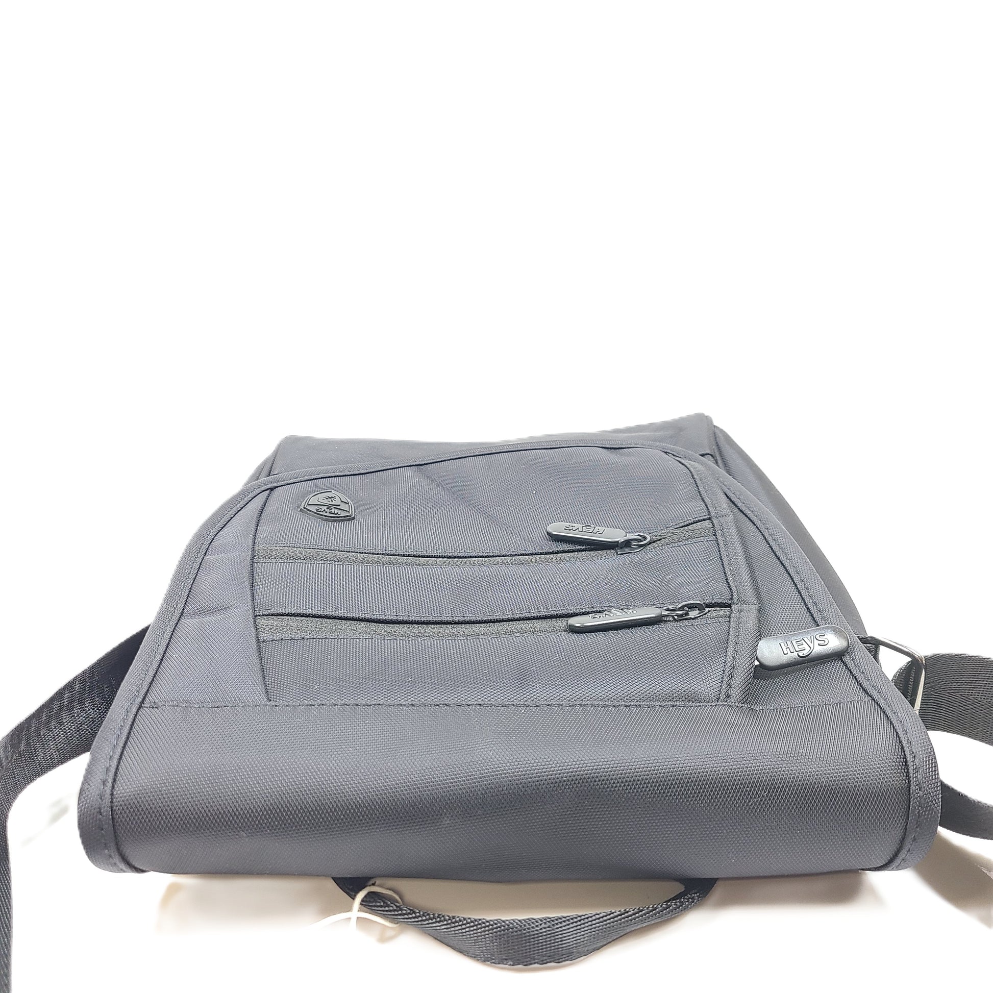 Compact black RFID-shield crossbody messenger bag with magnetic front flap for secure everyday carry.