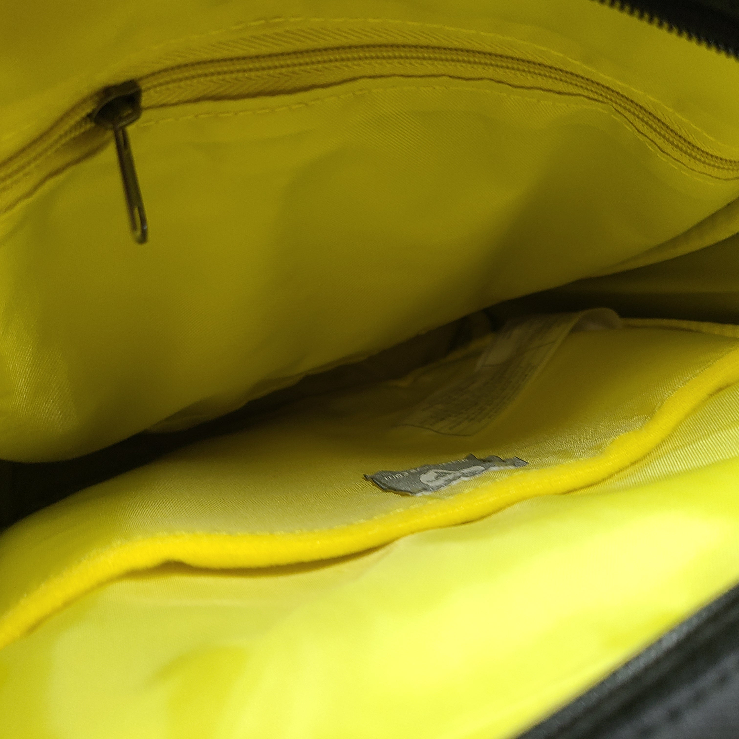 Compact black RFID-shield crossbody messenger bag with magnetic front flap for secure everyday carry.