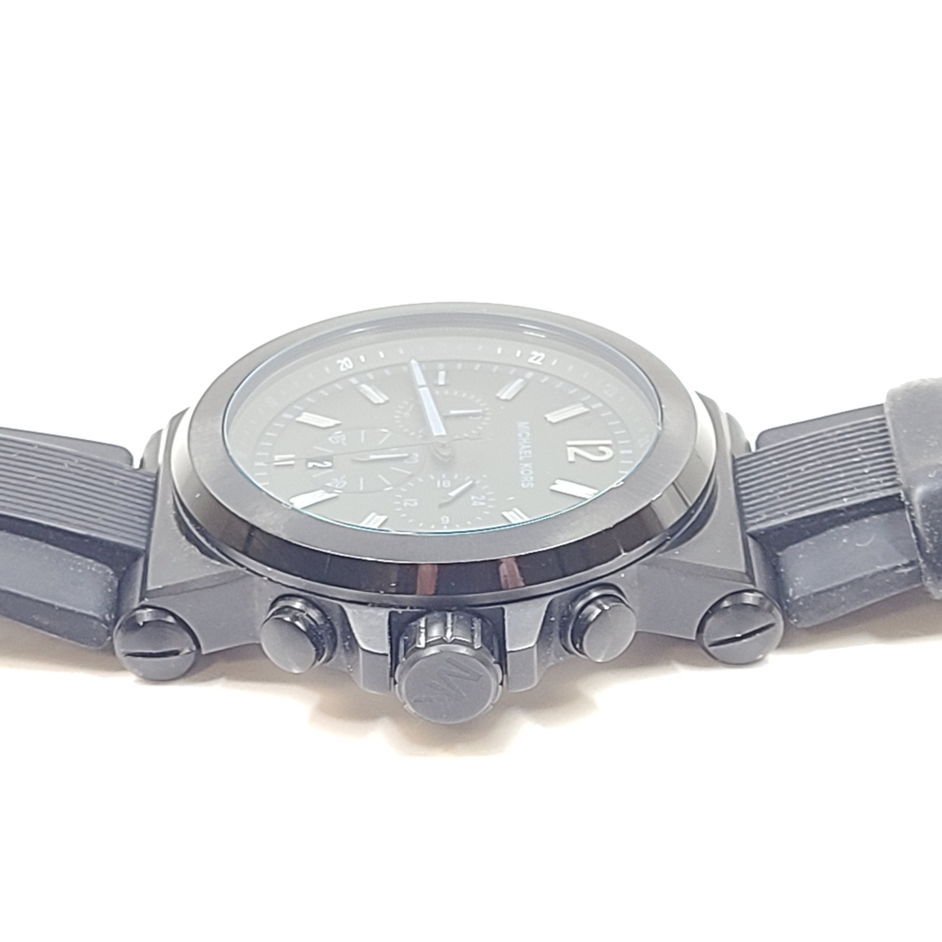 Michael Kors MK-8352 black chronograph wristwatch with stainless steel case and bracelet.