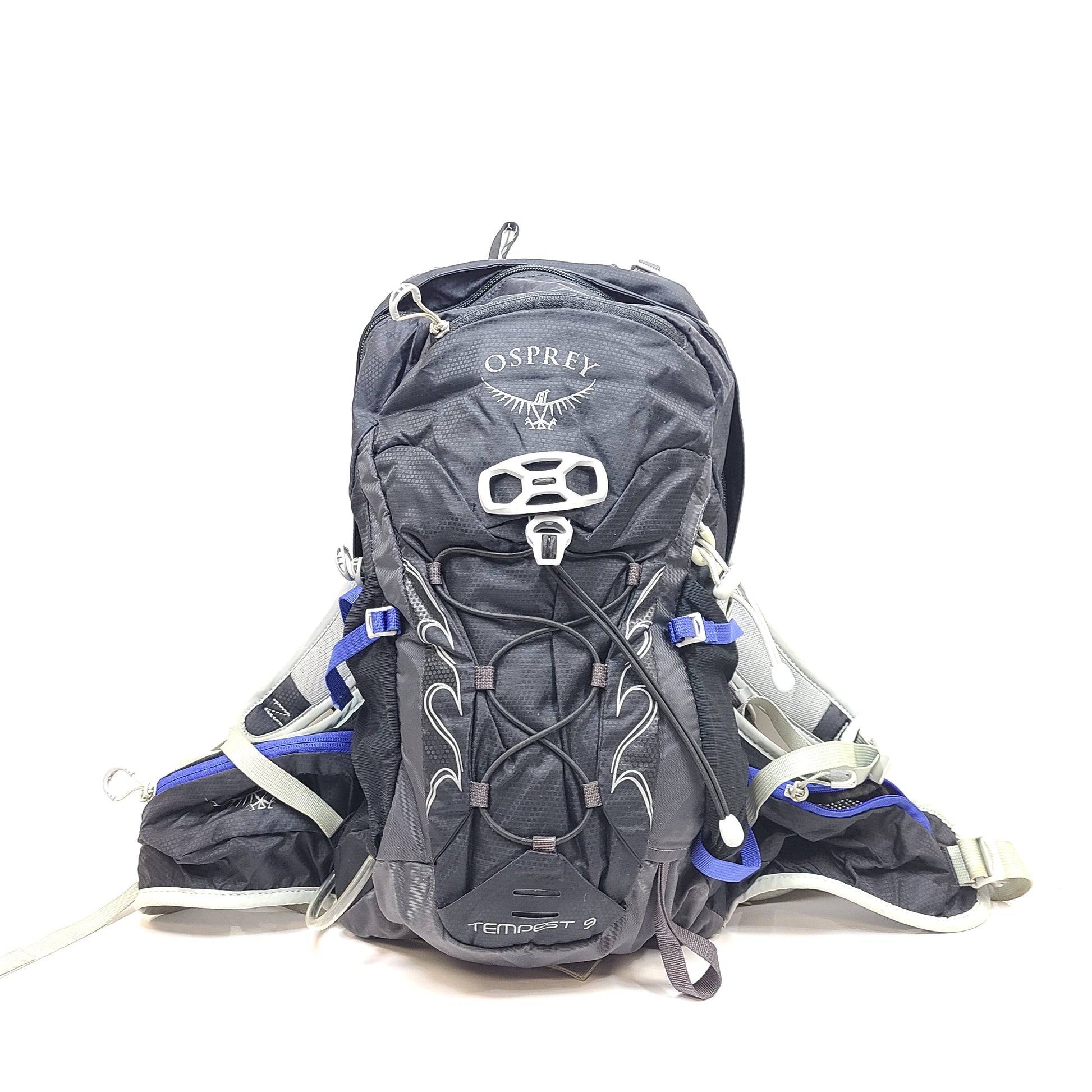 Compact Osprey Tempest 9 backpack in black, blue, and grey with Airscape back panel and adjustable straps for comfortable carry.