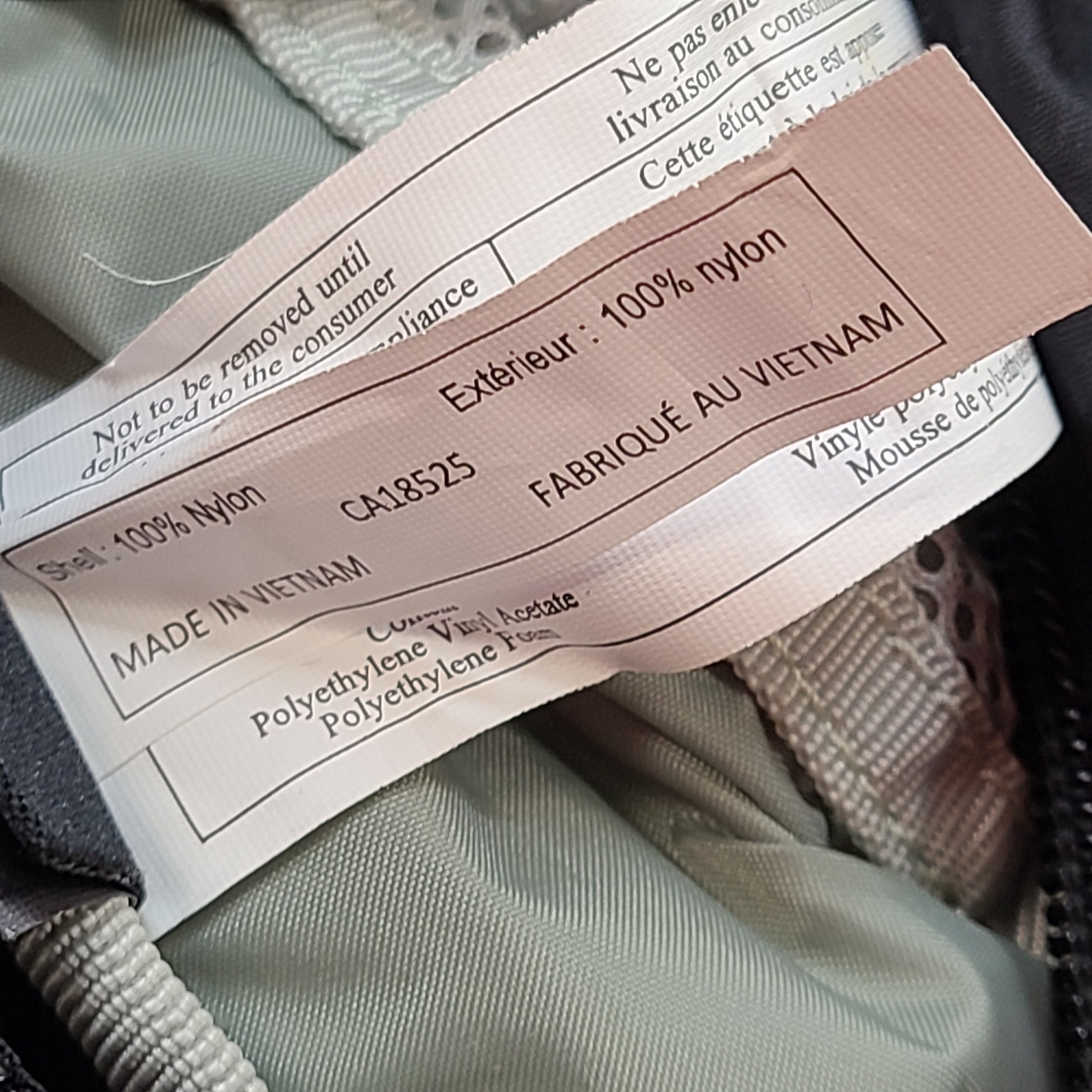 Compact Osprey Tempest 9 backpack in black, blue, and grey with Airscape back panel and adjustable straps for comfortable carry.