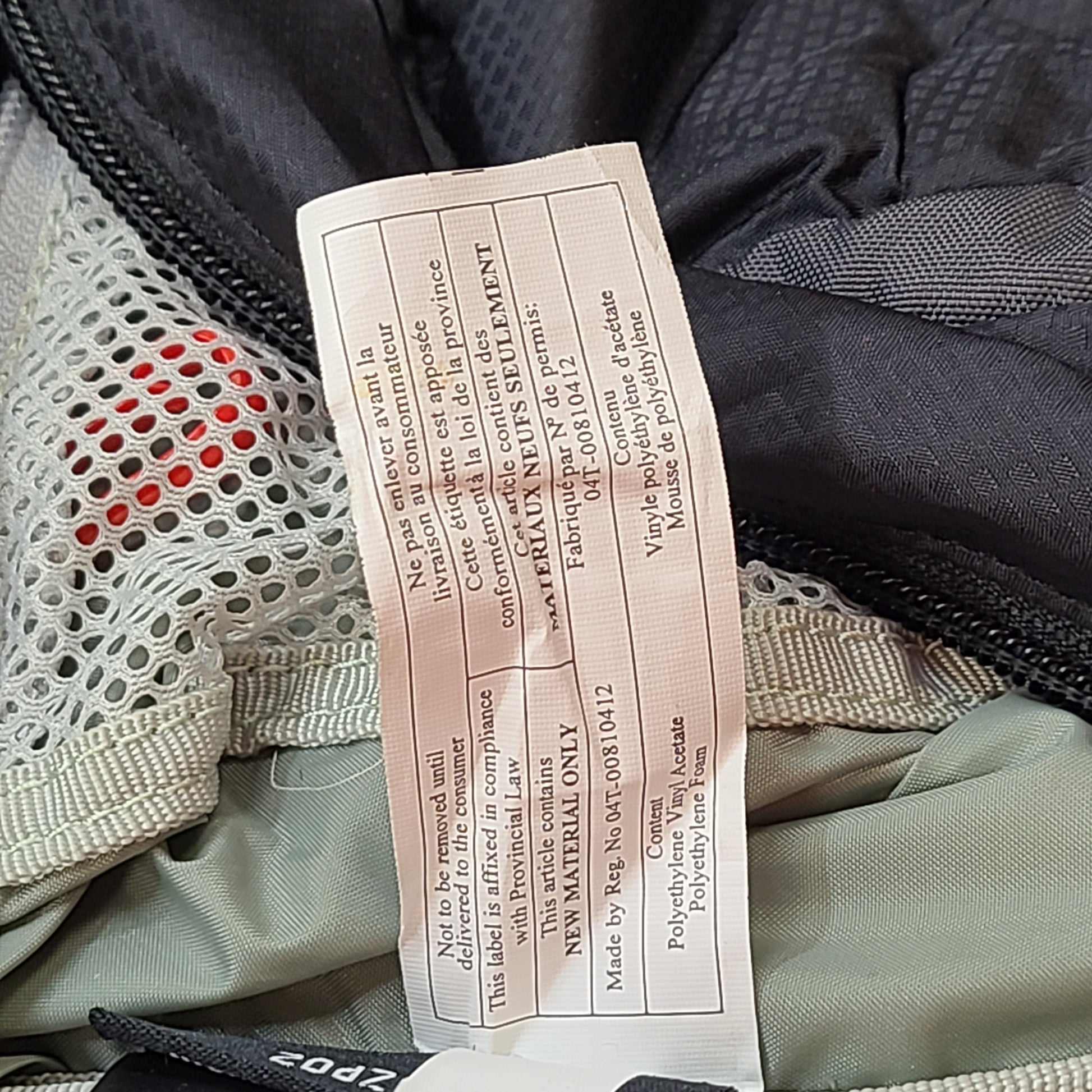 Compact Osprey Tempest 9 backpack in black, blue, and grey with Airscape back panel and adjustable straps for comfortable carry.