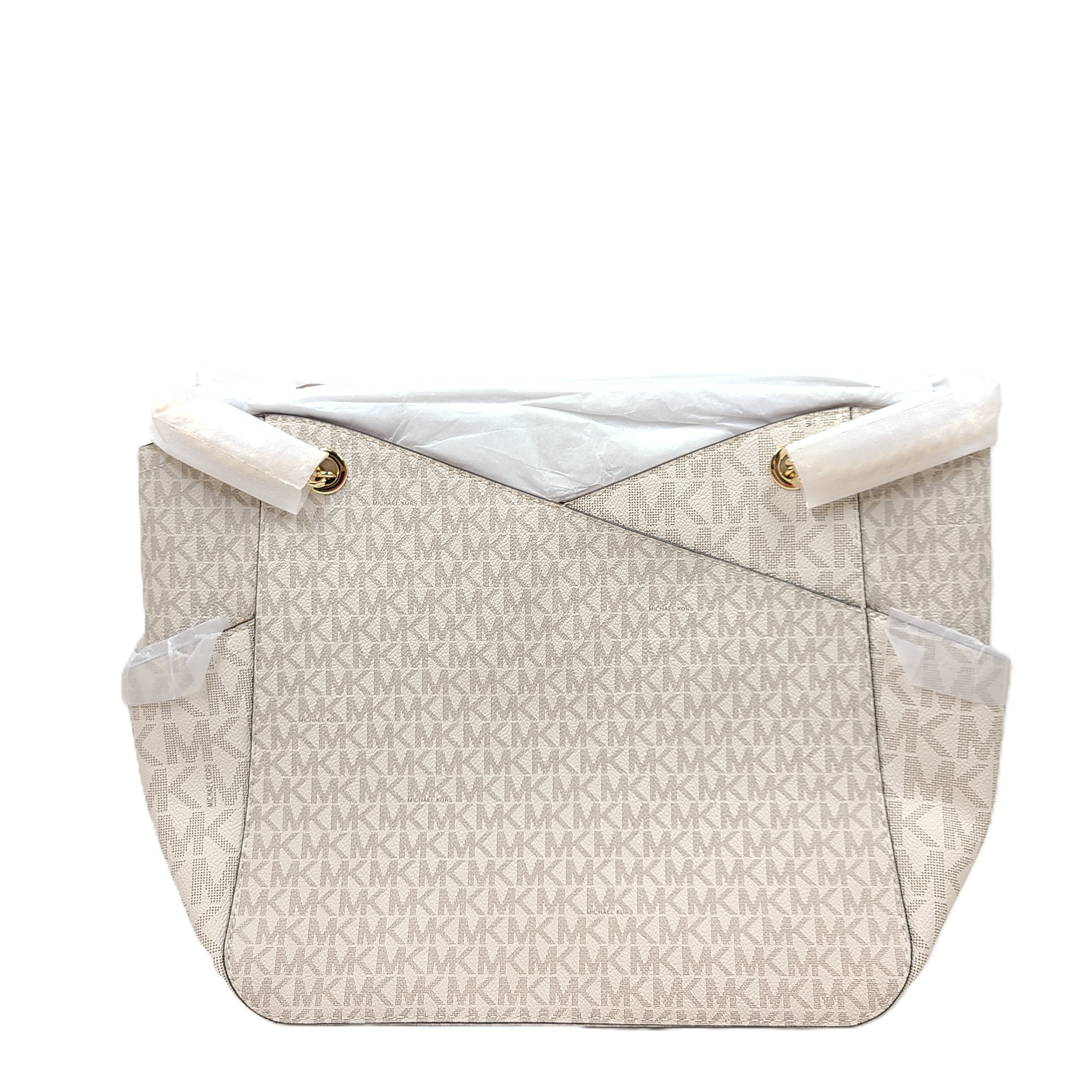 Michael Kors Jet Set Travel large chain shoulder tote in vanilla with signature logo and gold-tone chain detail.