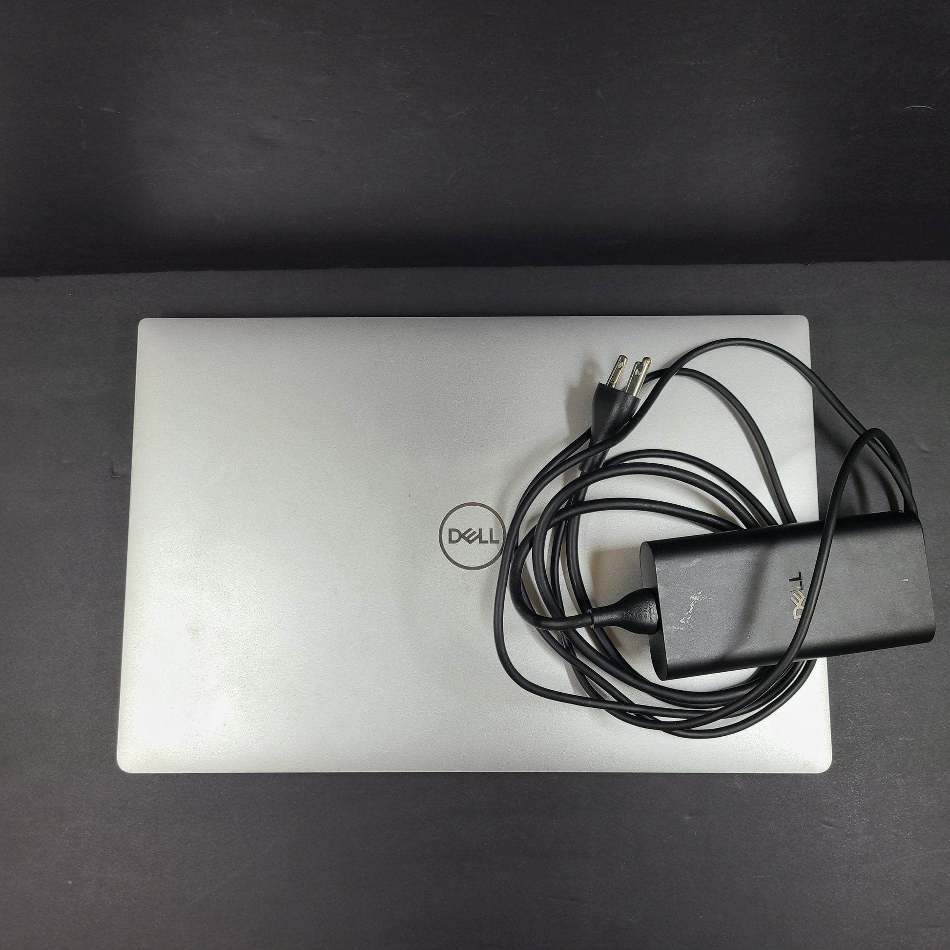 Silver Dell XPS 15 7590 laptop with Intel i5 CPU, 8GB RAM and 256GB SSD for responsive everyday use.