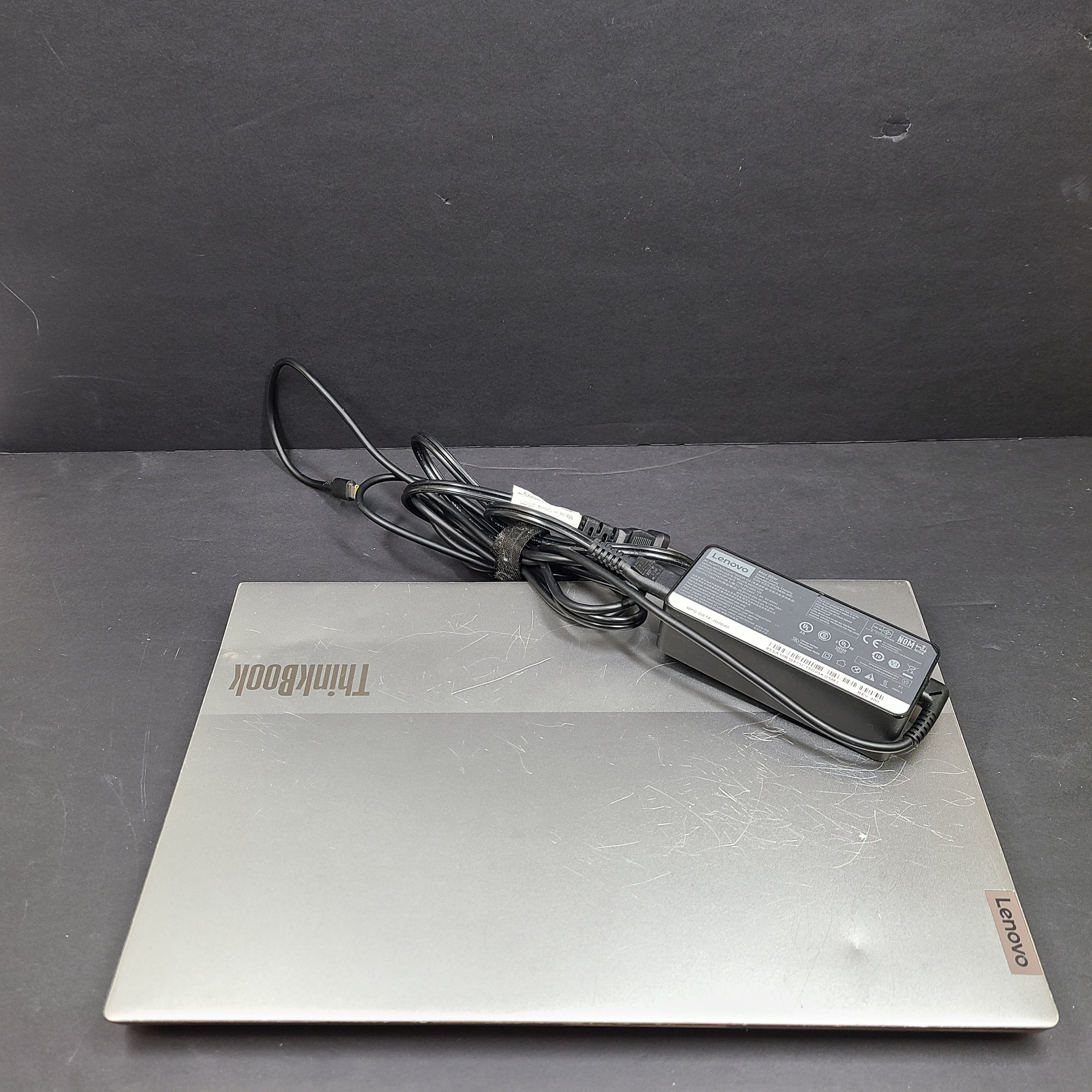 Silver Lenovo ThinkBook with AMD Ryzen 5 and 8GB RAM designed for reliable everyday productivity.