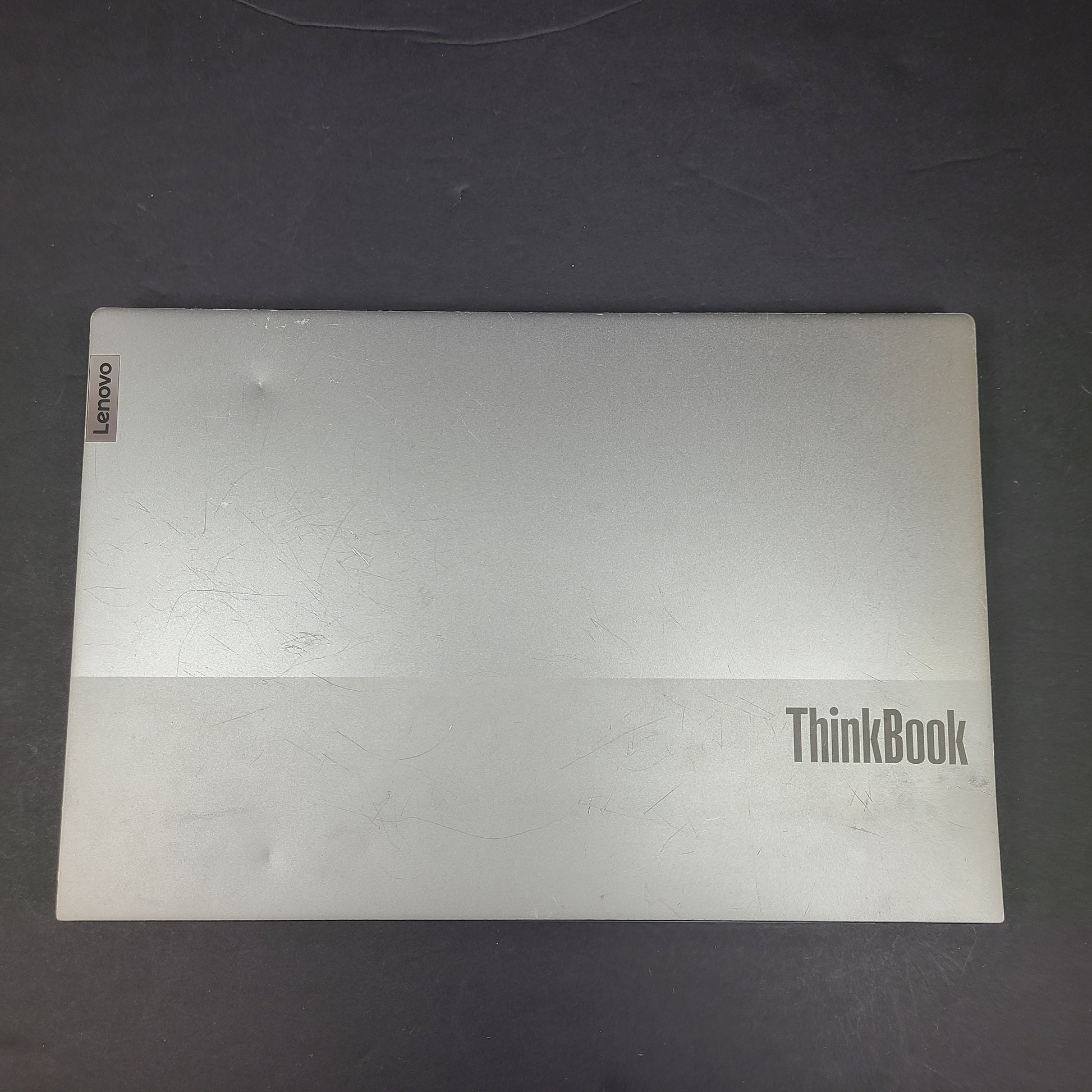 Silver Lenovo ThinkBook with AMD Ryzen 5 and 8GB RAM designed for reliable everyday productivity.