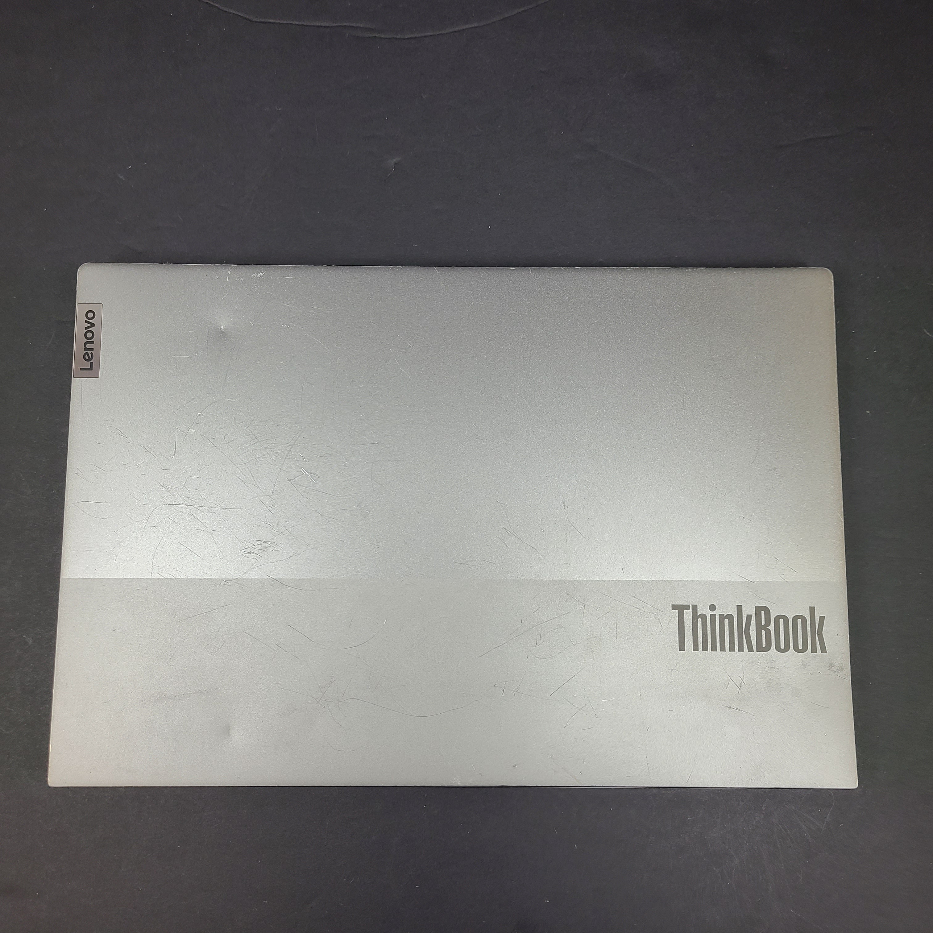 Silver Lenovo ThinkBook with AMD Ryzen 5 and 8GB RAM designed for reliable everyday productivity.
