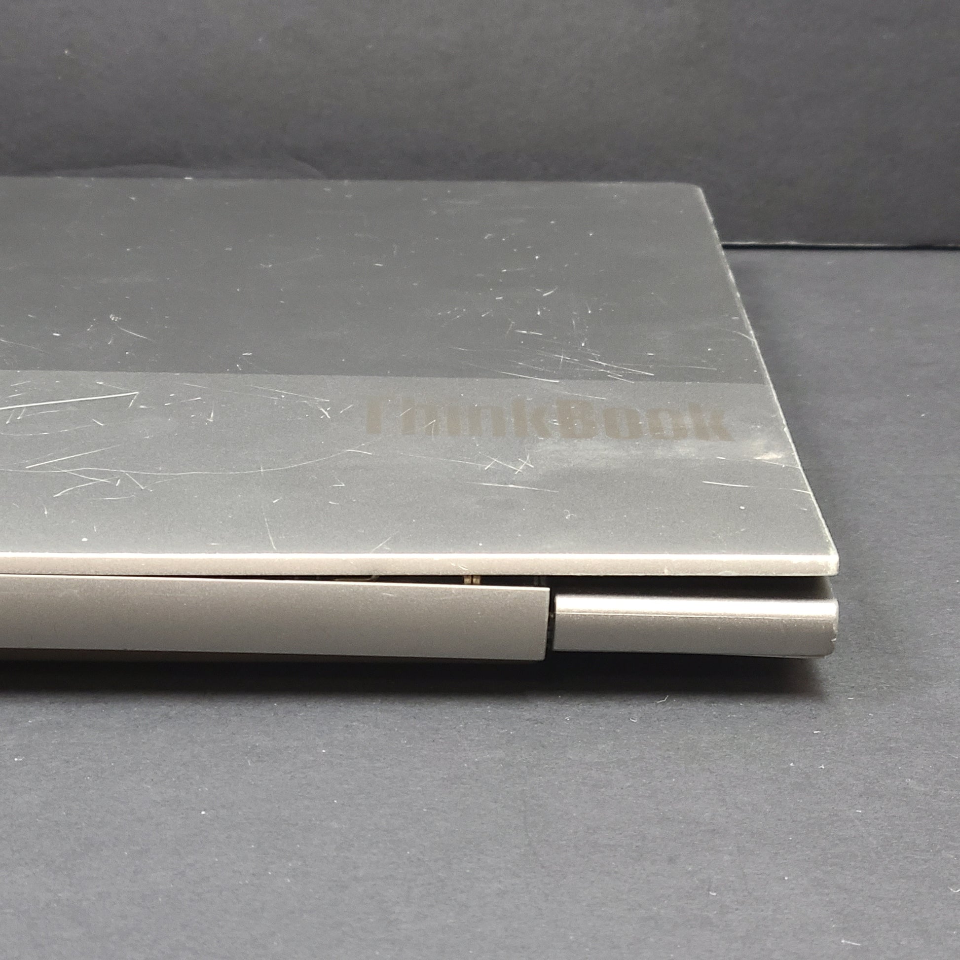 Silver Lenovo ThinkBook with AMD Ryzen 5 and 8GB RAM designed for reliable everyday productivity.