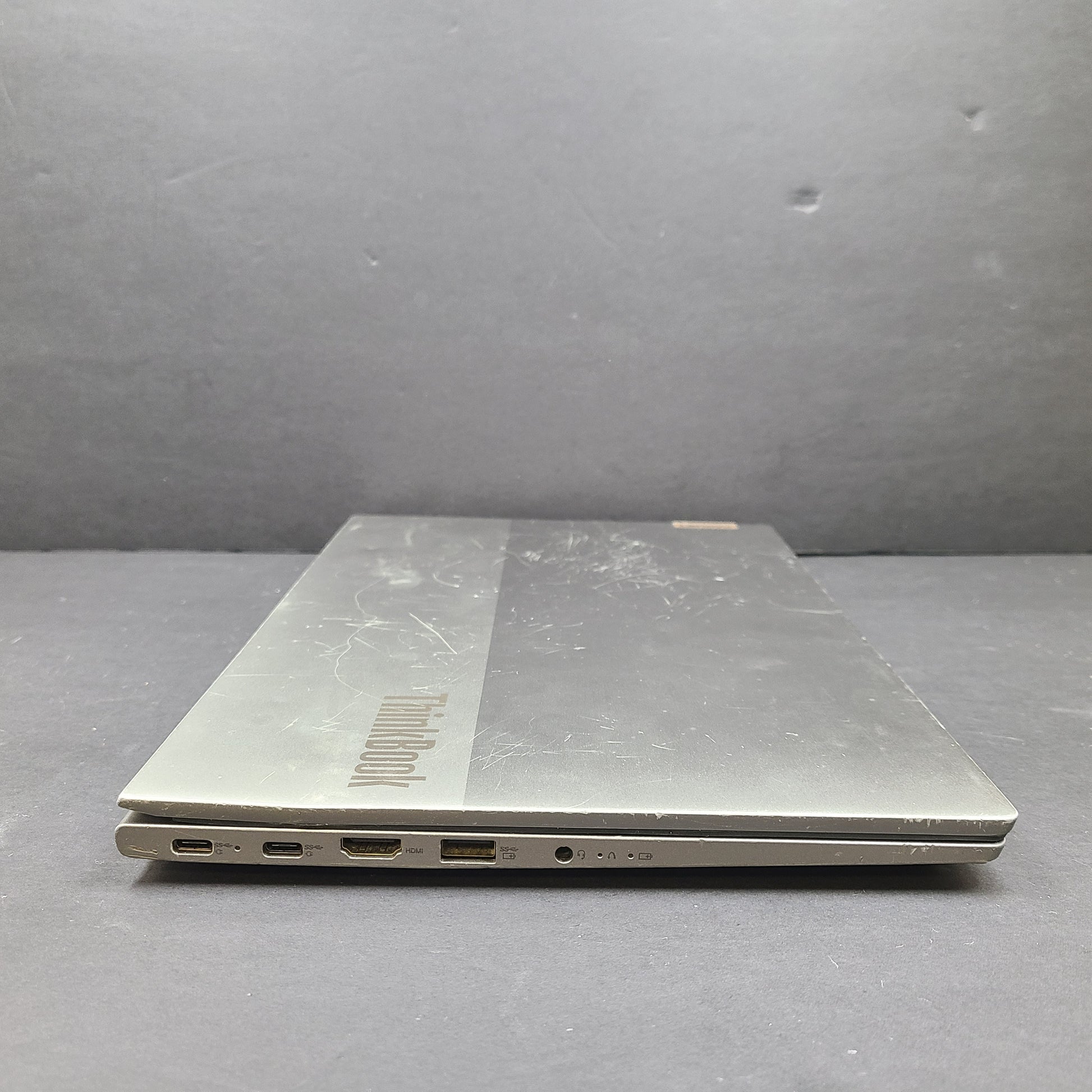 Silver Lenovo ThinkBook with AMD Ryzen 5 and 8GB RAM designed for reliable everyday productivity.