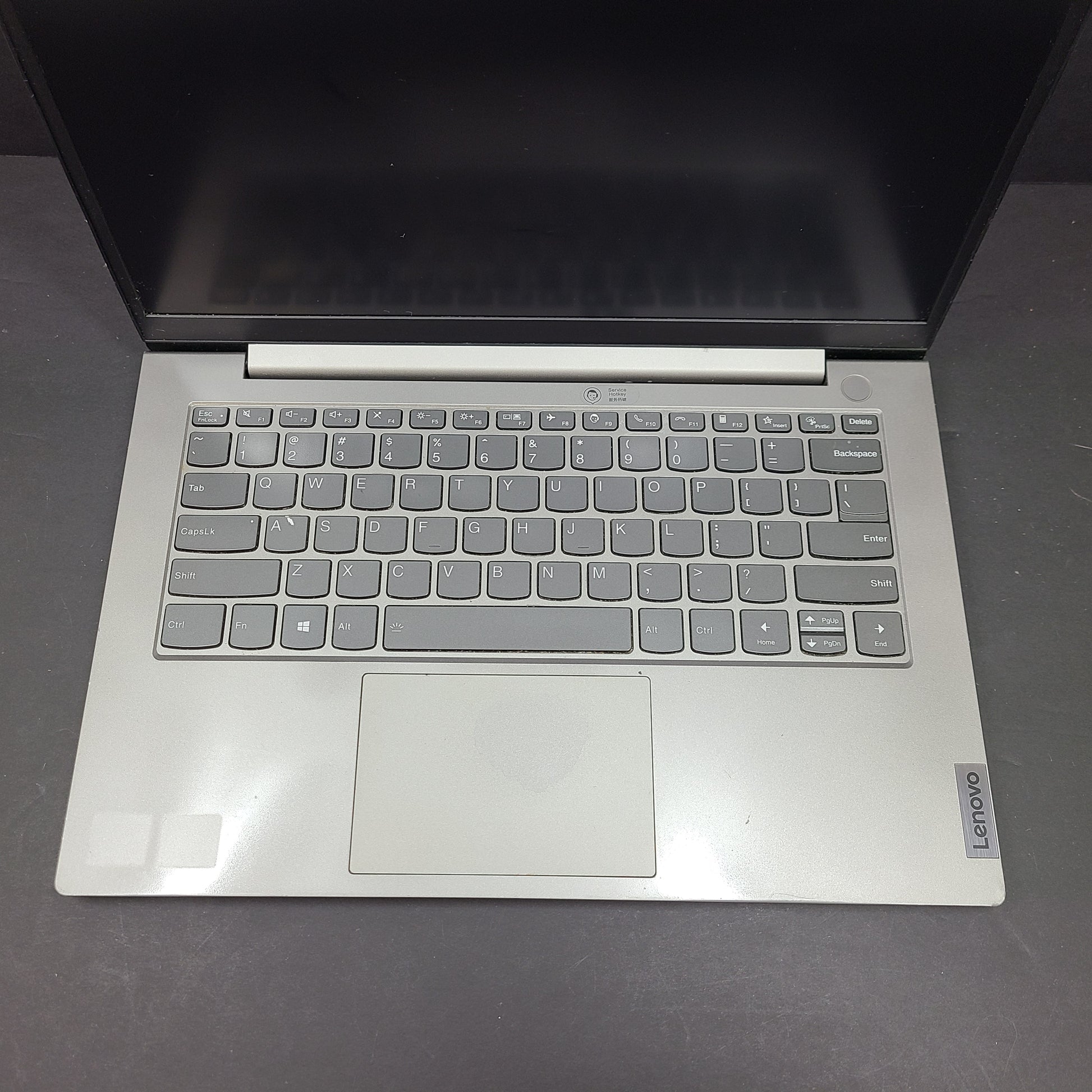 Silver Lenovo ThinkBook with AMD Ryzen 5 and 8GB RAM designed for reliable everyday productivity.