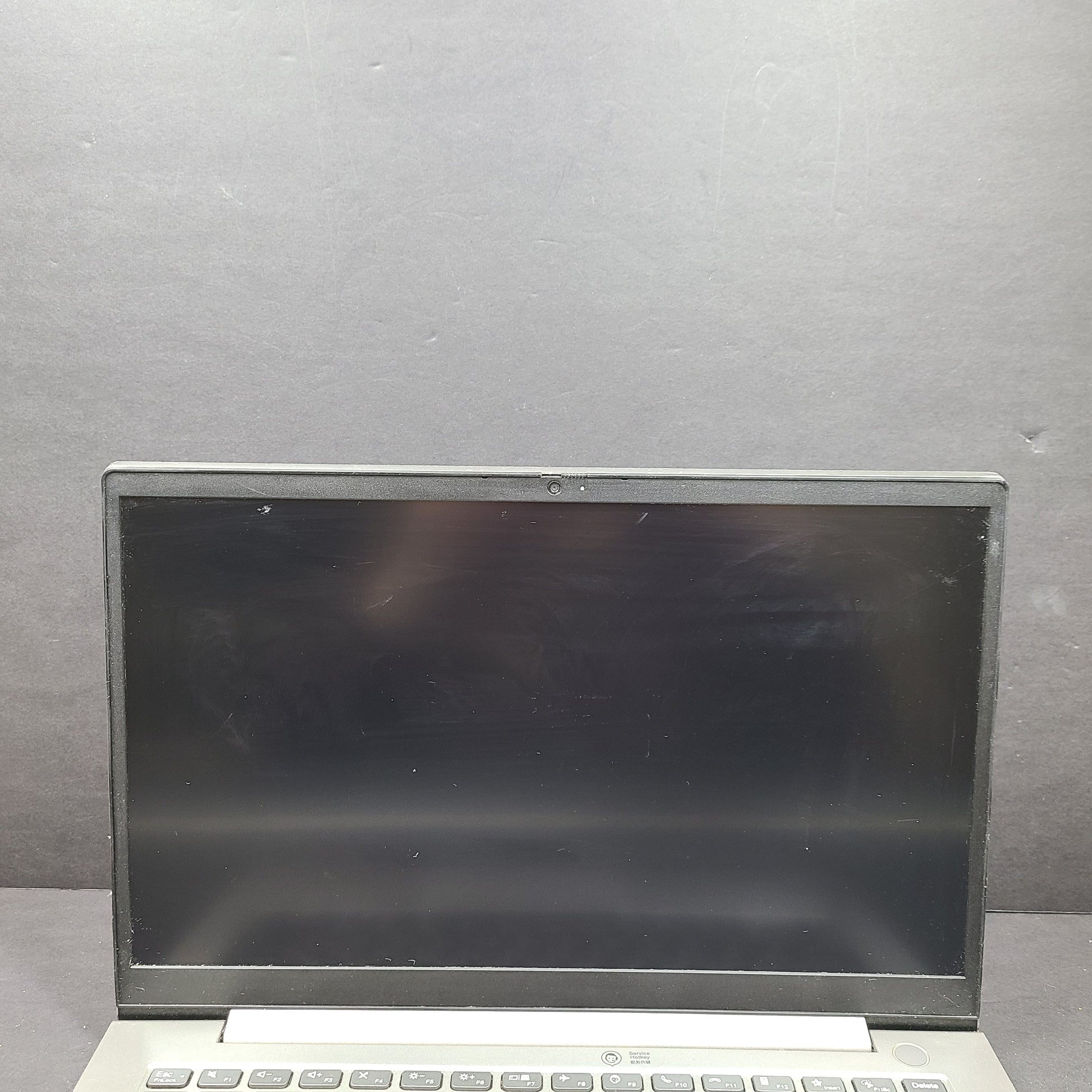 Silver Lenovo ThinkBook with AMD Ryzen 5 and 8GB RAM designed for reliable everyday productivity.