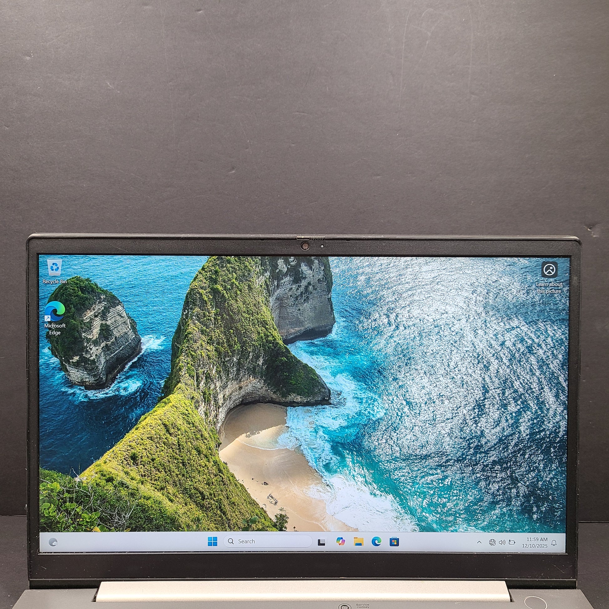 Silver Lenovo ThinkBook with AMD Ryzen 5 and 8GB RAM designed for reliable everyday productivity.