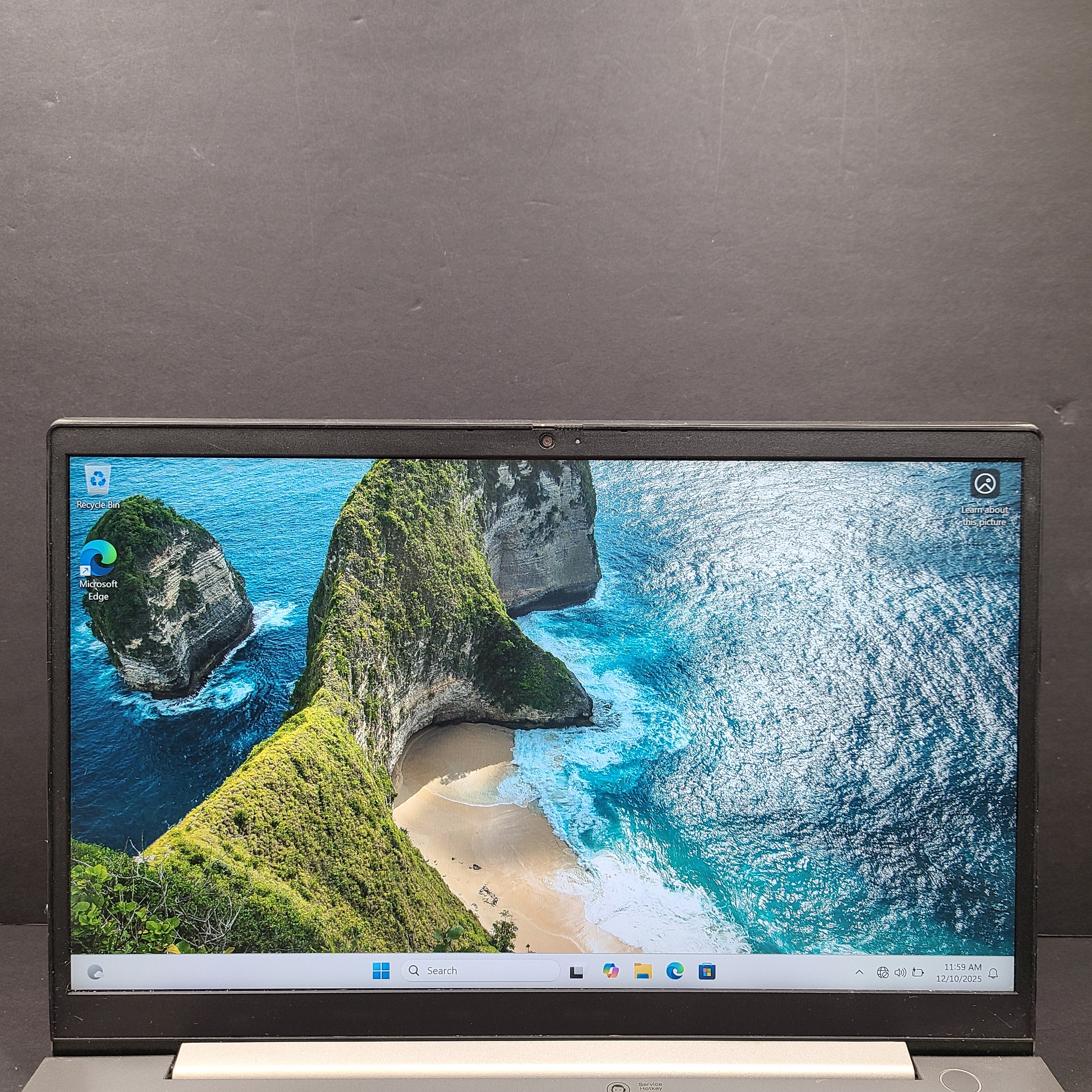 Silver Lenovo ThinkBook with AMD Ryzen 5 and 8GB RAM designed for reliable everyday productivity.