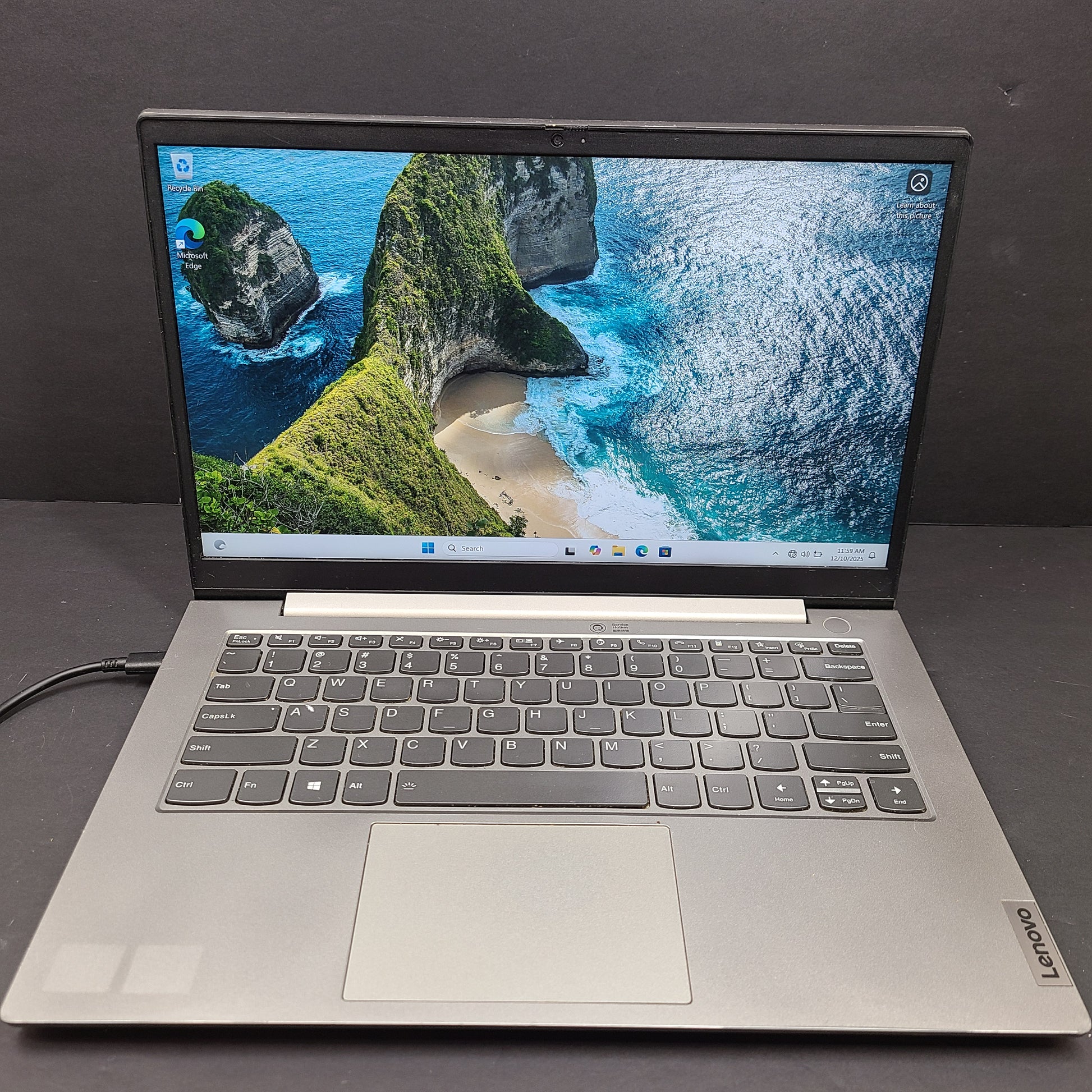 Silver Lenovo ThinkBook with AMD Ryzen 5 and 8GB RAM designed for reliable everyday productivity.