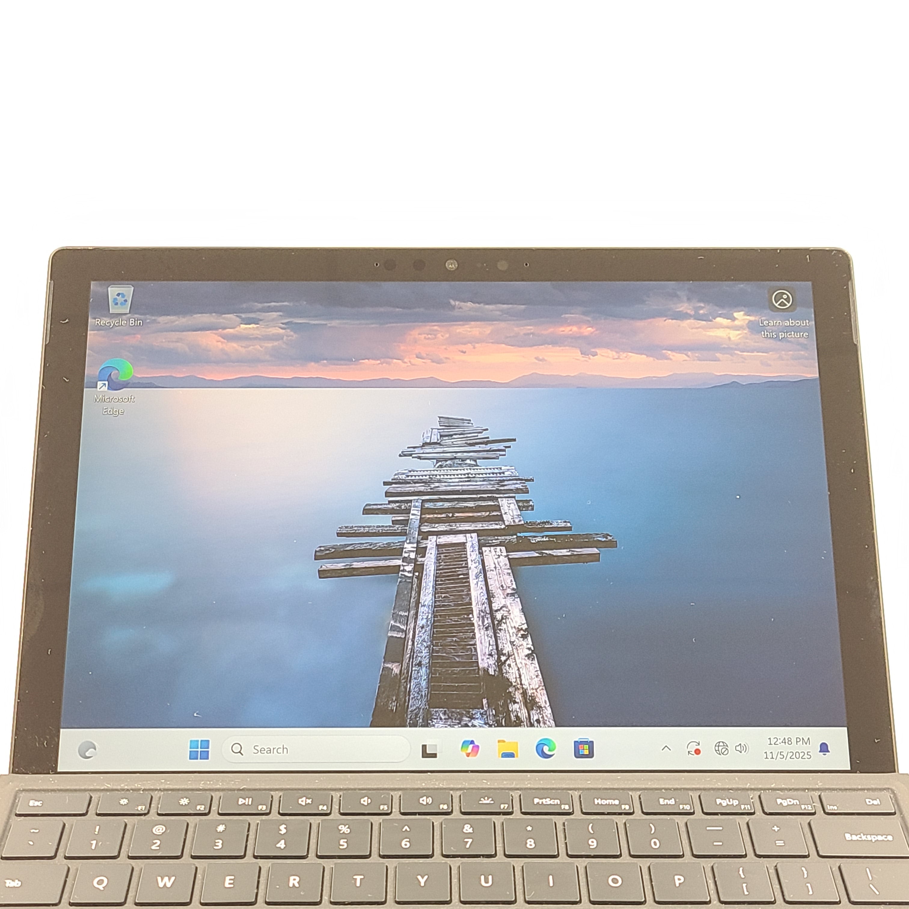 Microsoft Surface Pro 7 in black with Intel Core i5 performance and pen with 25-point touch support.