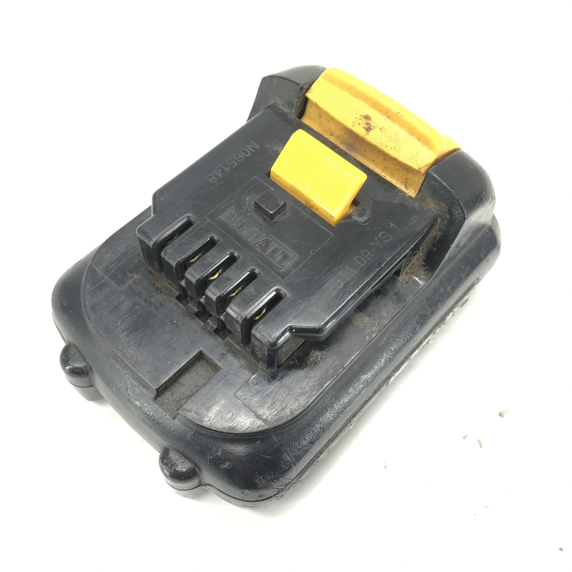Black and yellow battery pack on a white background
